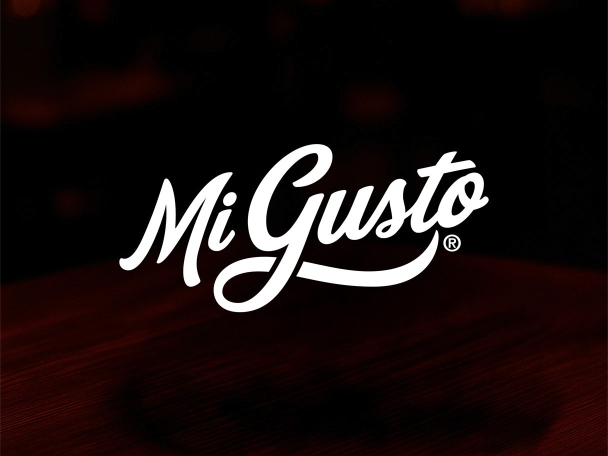 Rustic cabin in a golden field at sunset