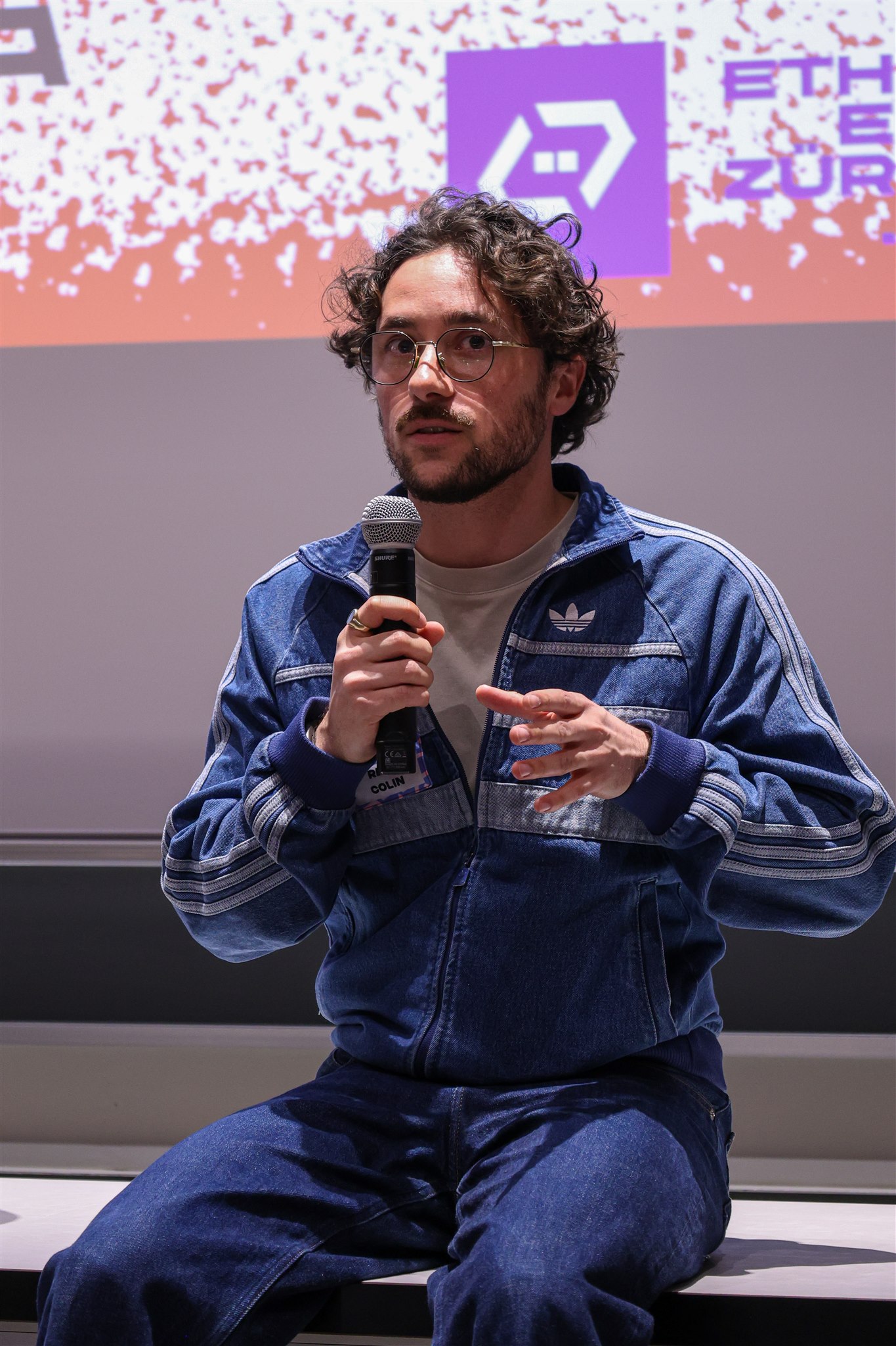 Panel speaker explaining topic during EthereumZüri conference in Zurich
