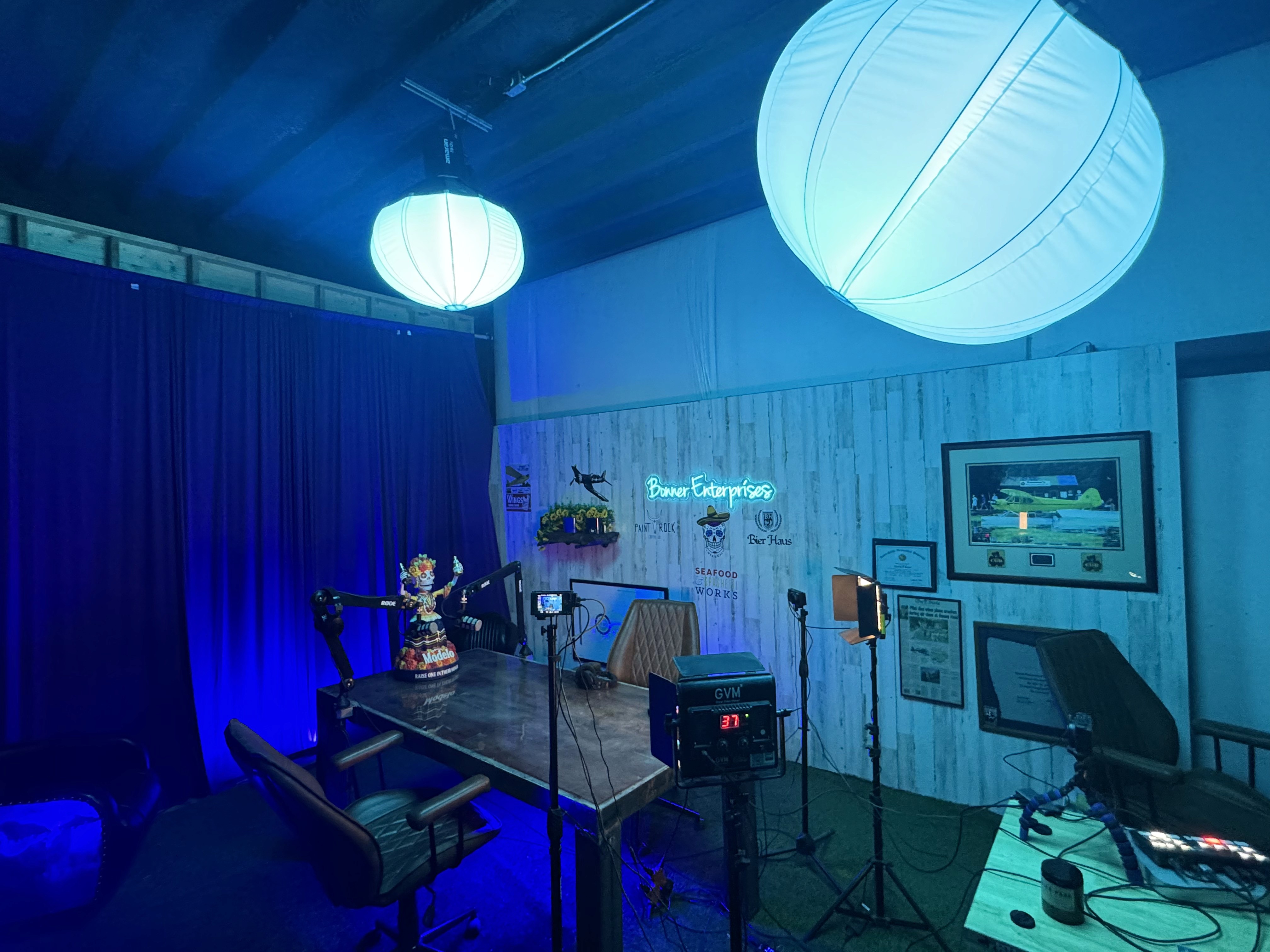 person playing brown and white acoustic guitars