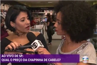 Cláudia Matta sendo entrevistada ao vivo pela TV Globo