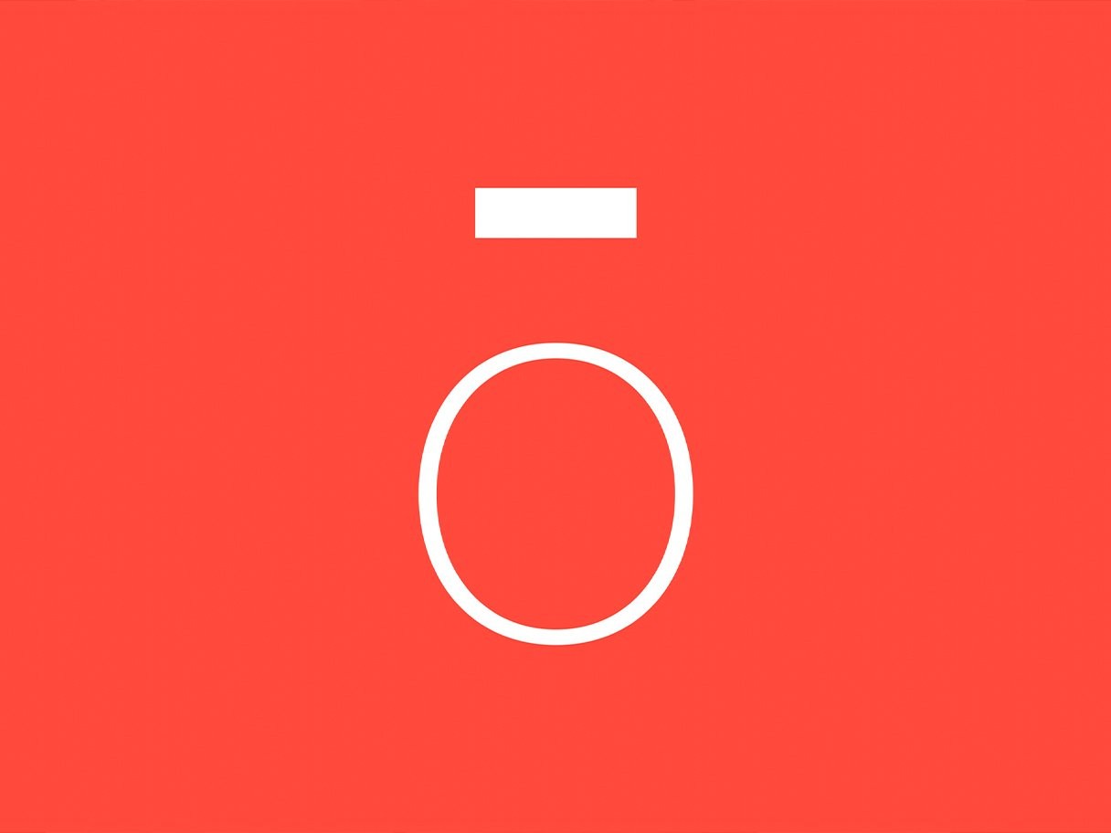 Rustic cabin in a golden field at sunset