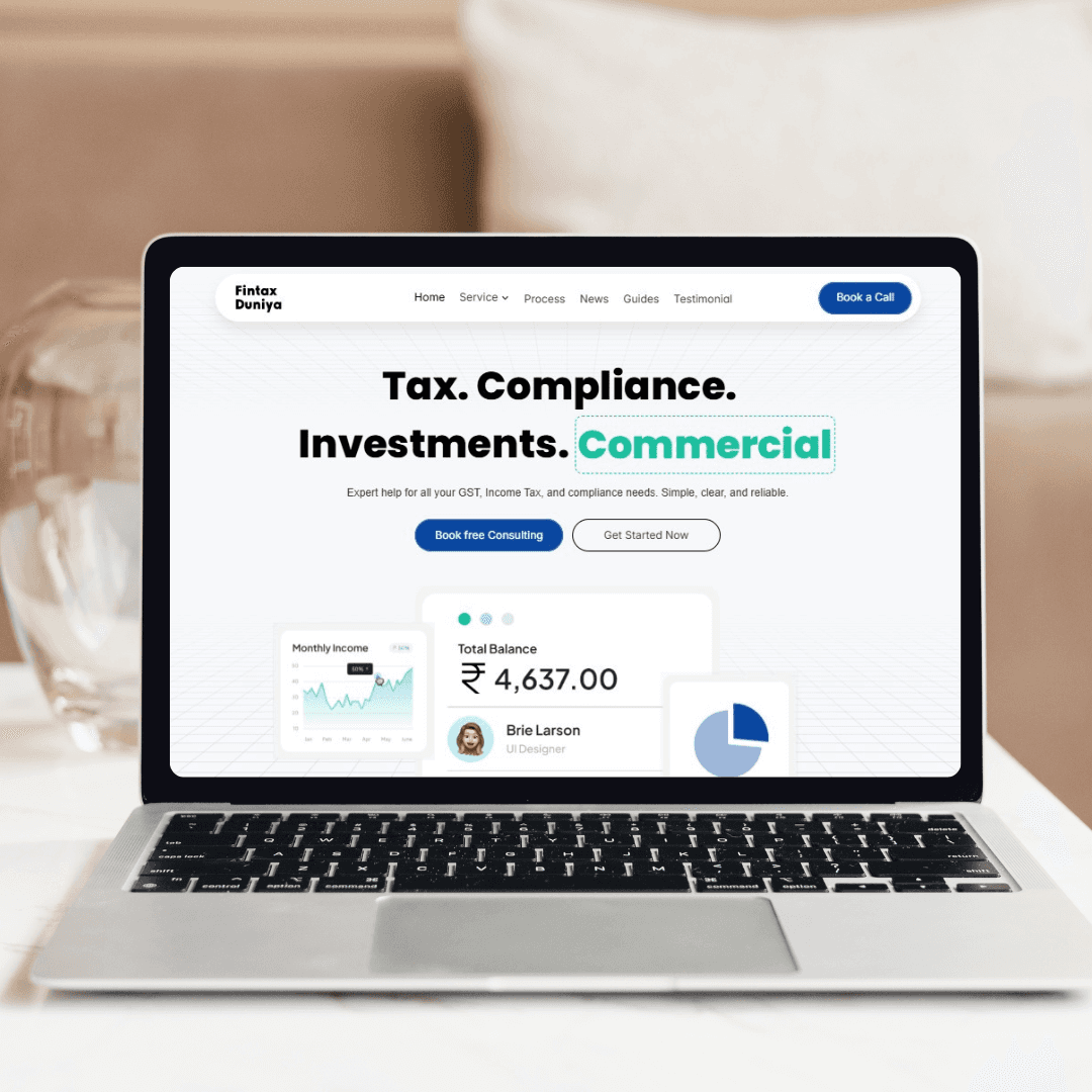 Red trolley car driving down a tree-lined street.