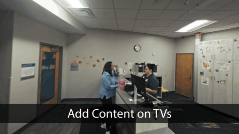 Modern living room with abstract art, beige sectional sofa, indoor plants, and large windows.