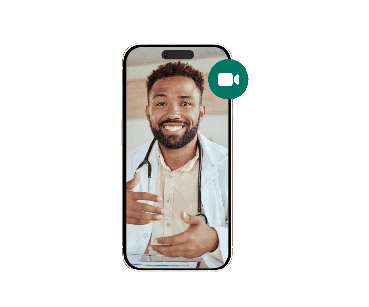 Male provider on a phone during a telehealth visit