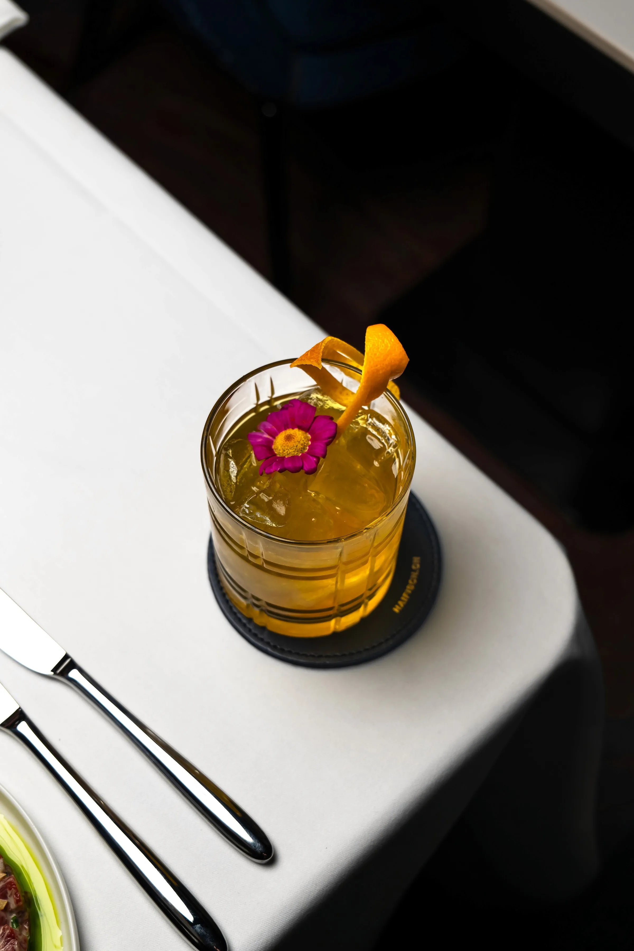 two people looking at a tablet and smiling