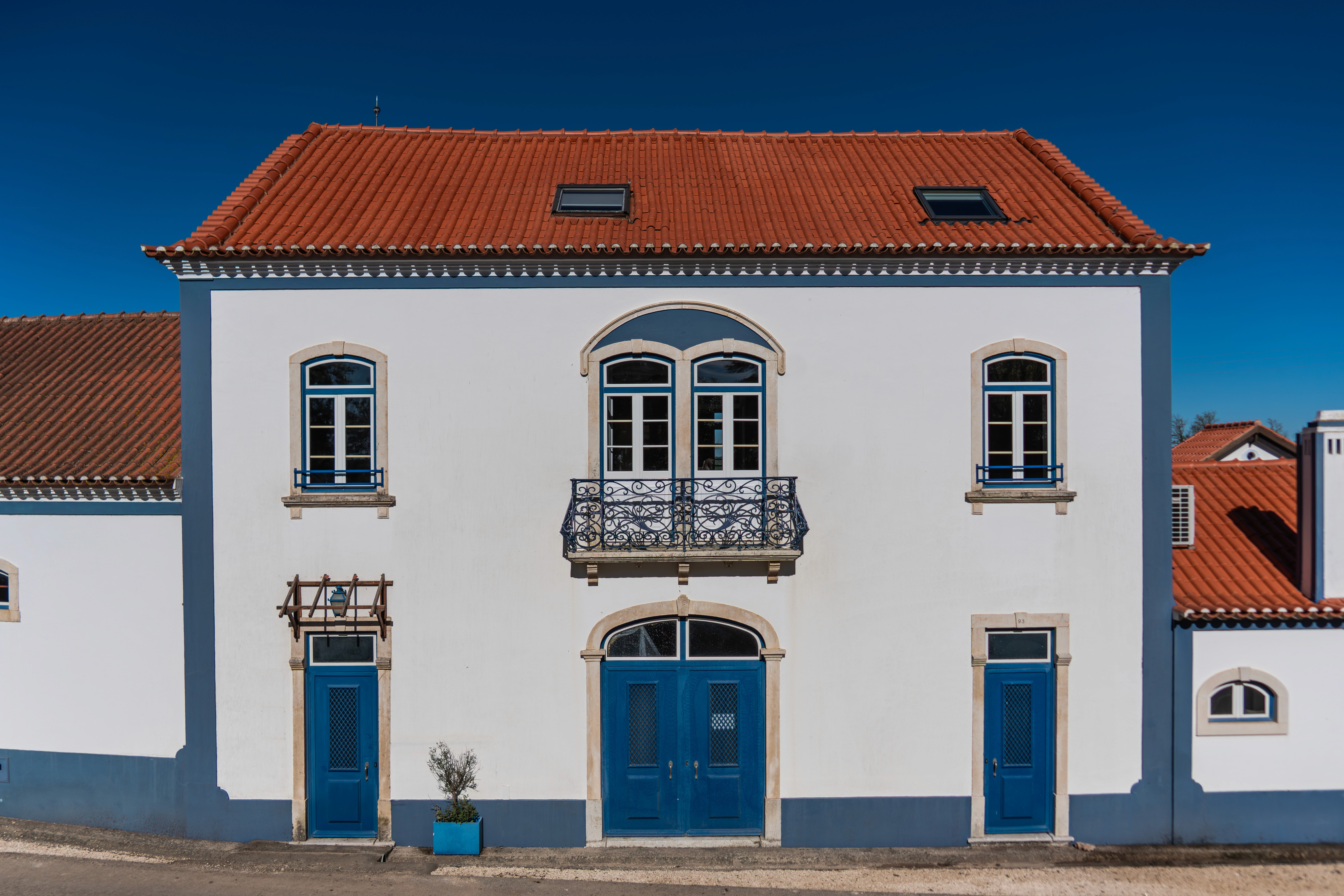 white and brown concrete building under blue sky during daytime