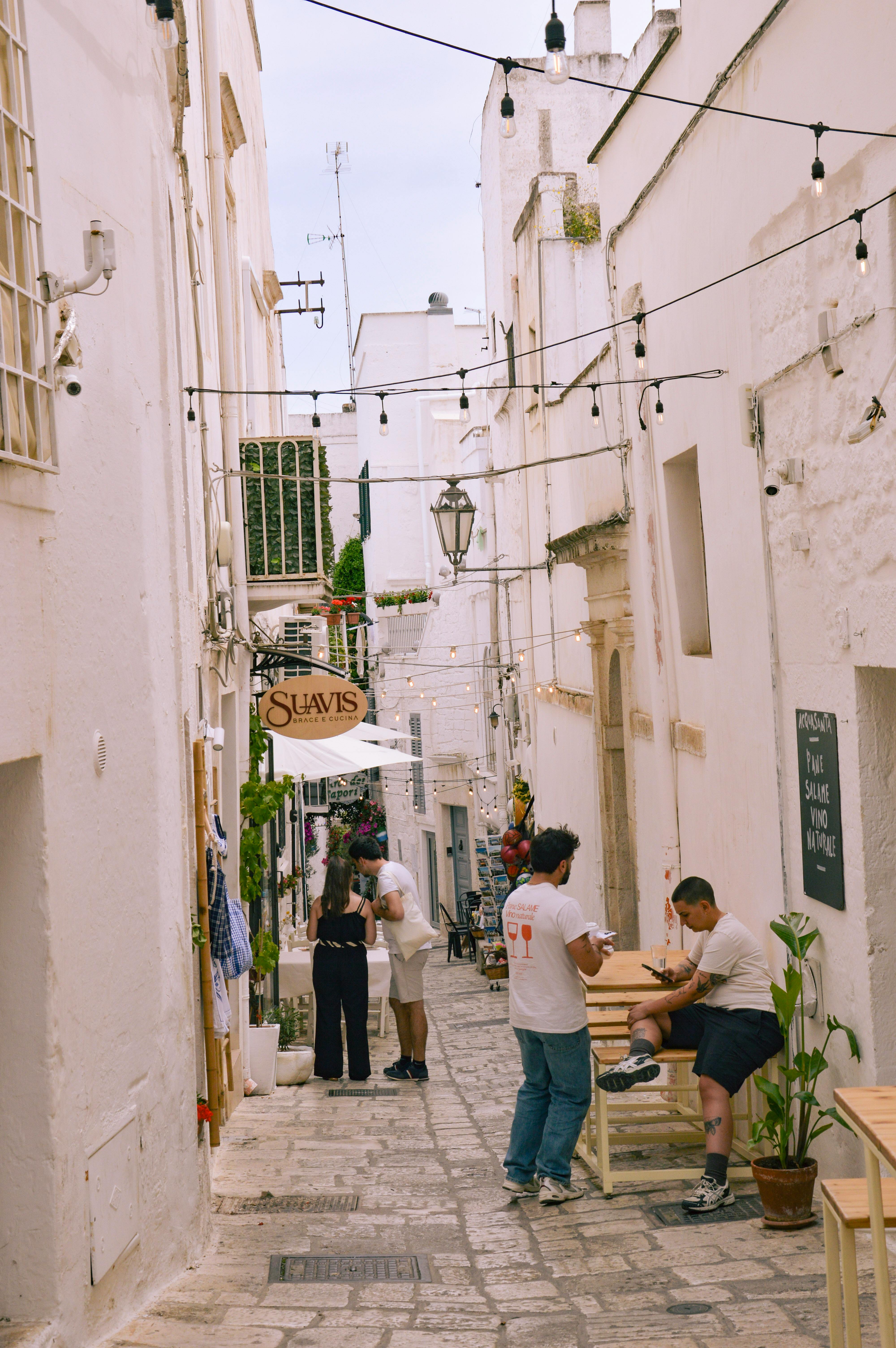 Ostuni, the white city, washed in lime against the blue Adriatic.