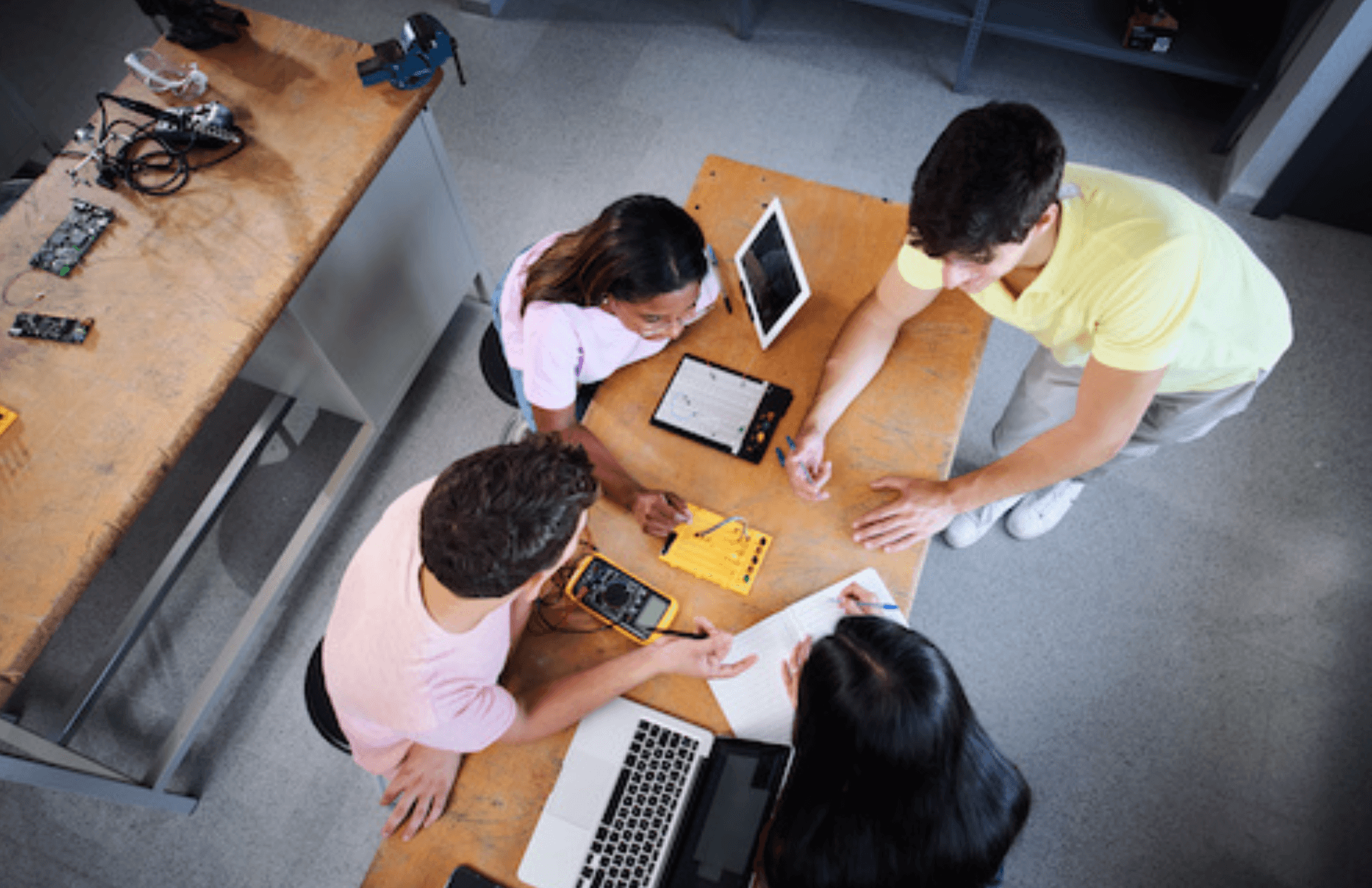 person writing on a piece of paper 