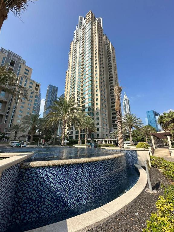 Full building view of Mesk Tower from the water, a top choice for real estate investment.