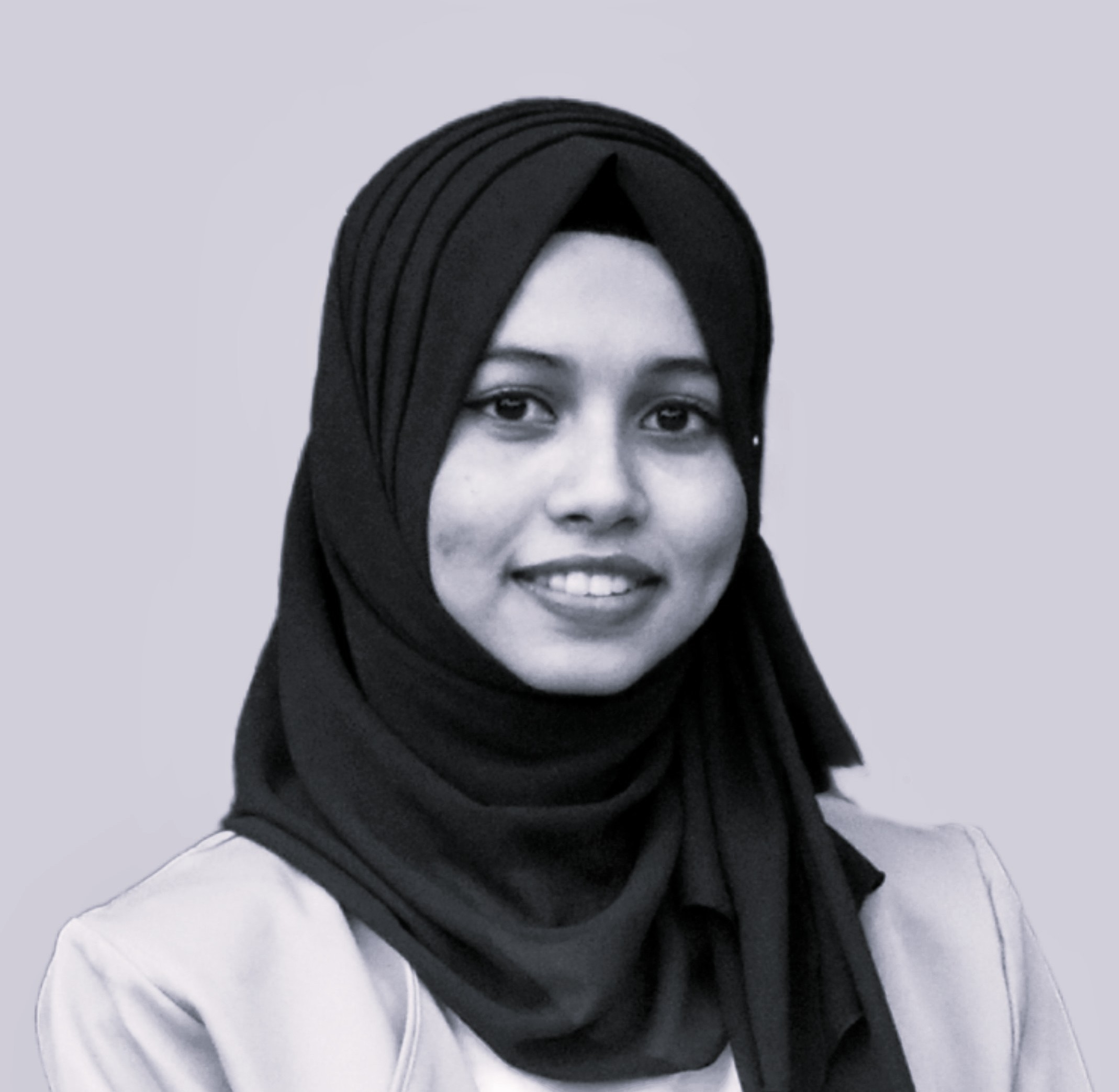 Team member at HW Financial Consultancy in formal attire and a headscarf.