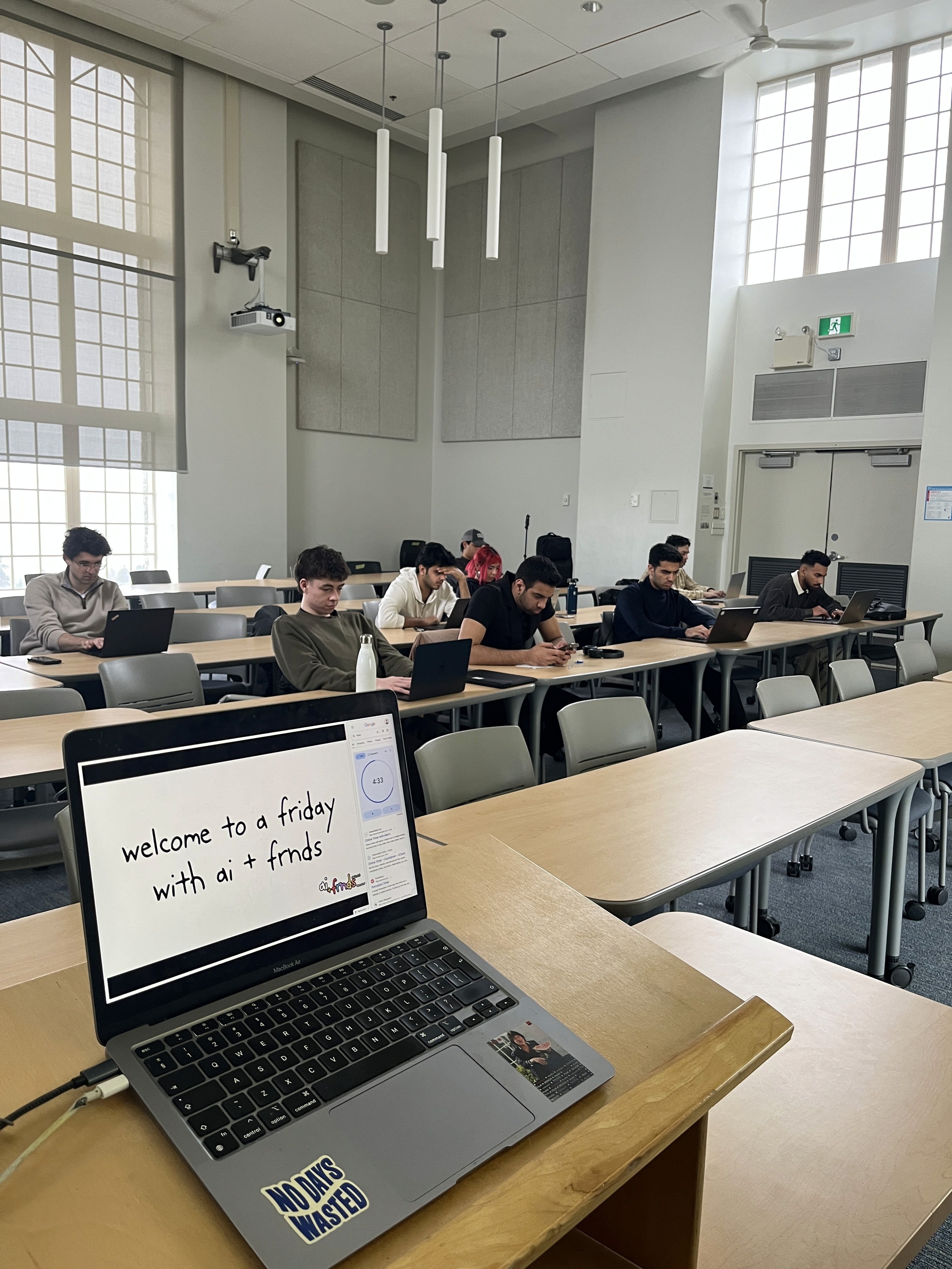 Man in VR headset interacts with green holographic code displayed on a curved screen.