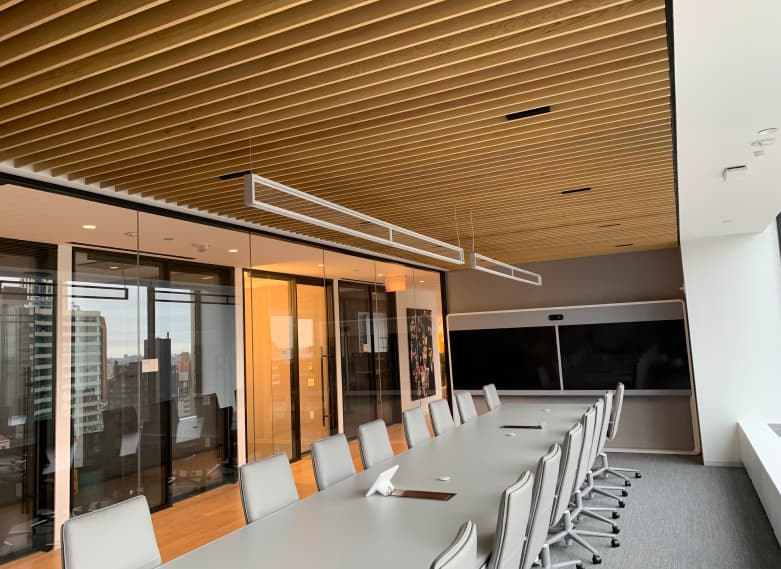 A brightly lit, new looking conference room