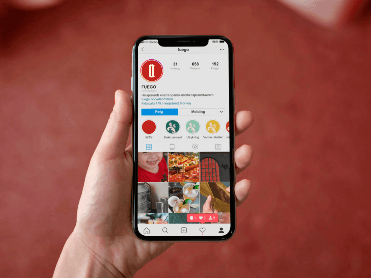 Bilde av hånd som holder mobil med instagram