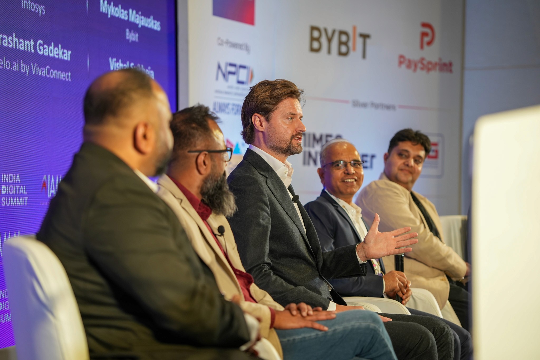 Crypto conference audience listening to keynote speaker