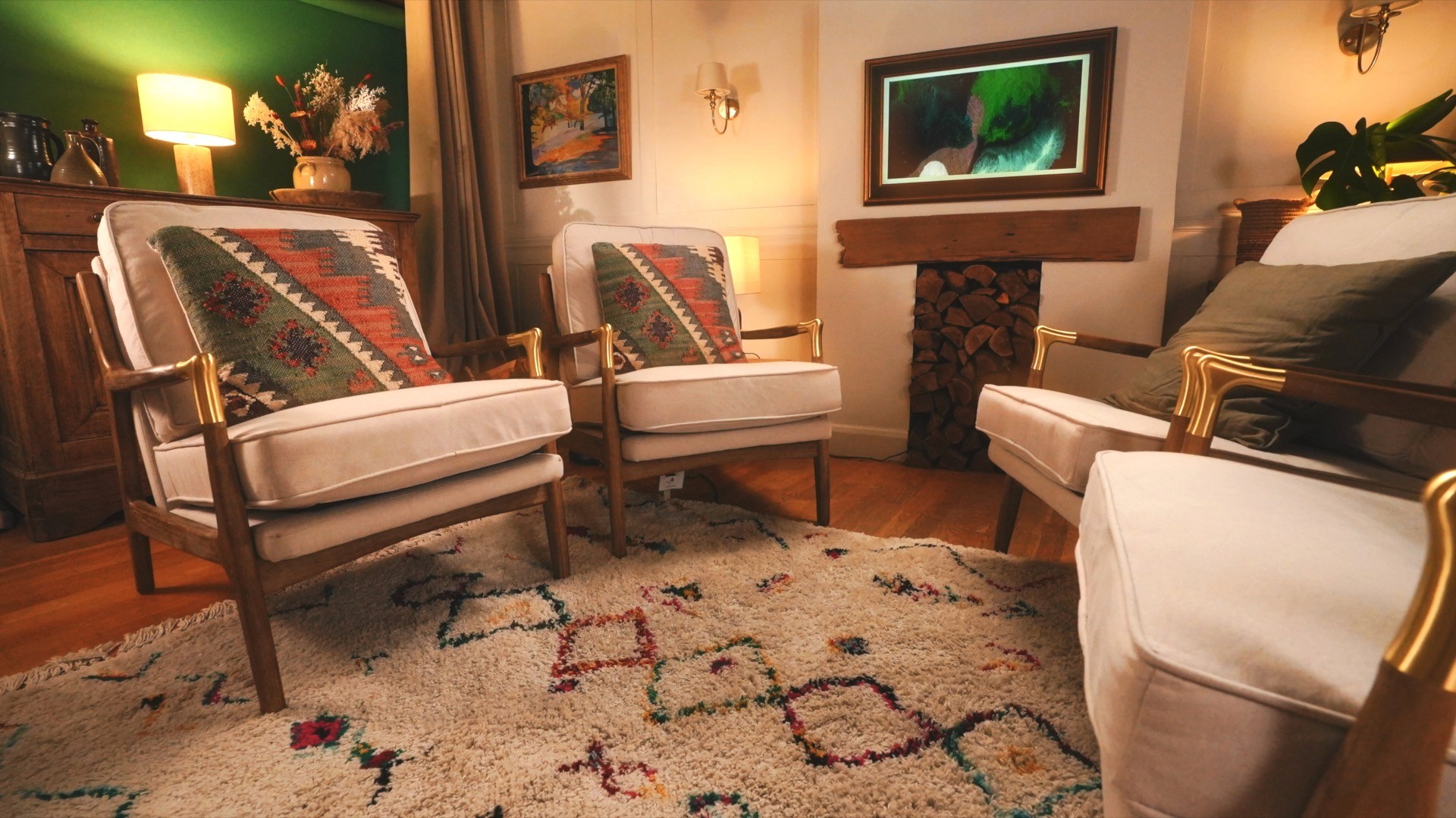 Terracotta wall interior with wooden architectural elements and dramatic natural light.