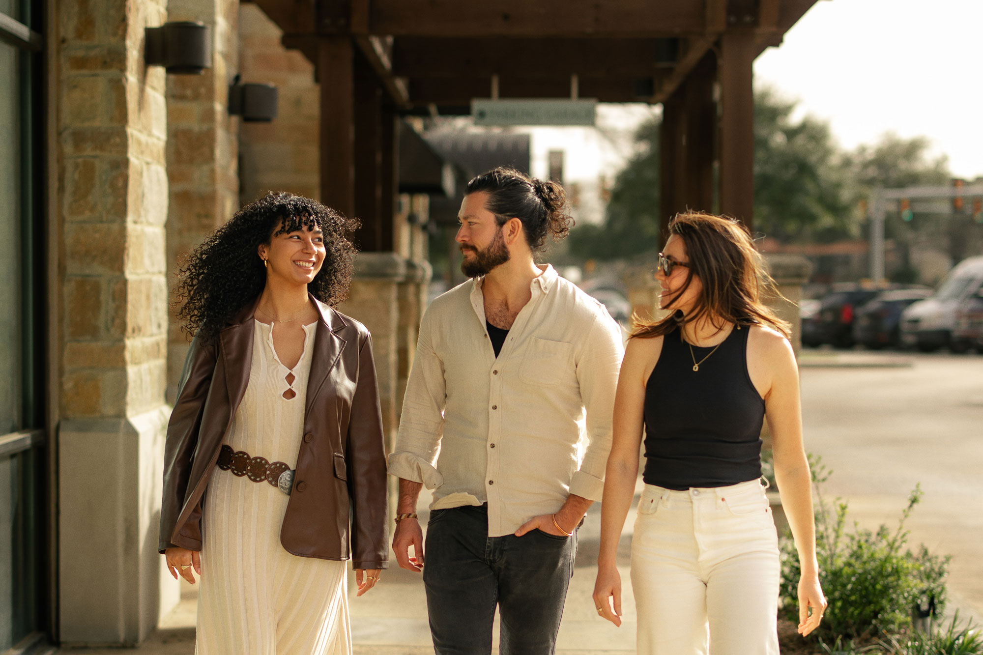 People walking outside shopping center