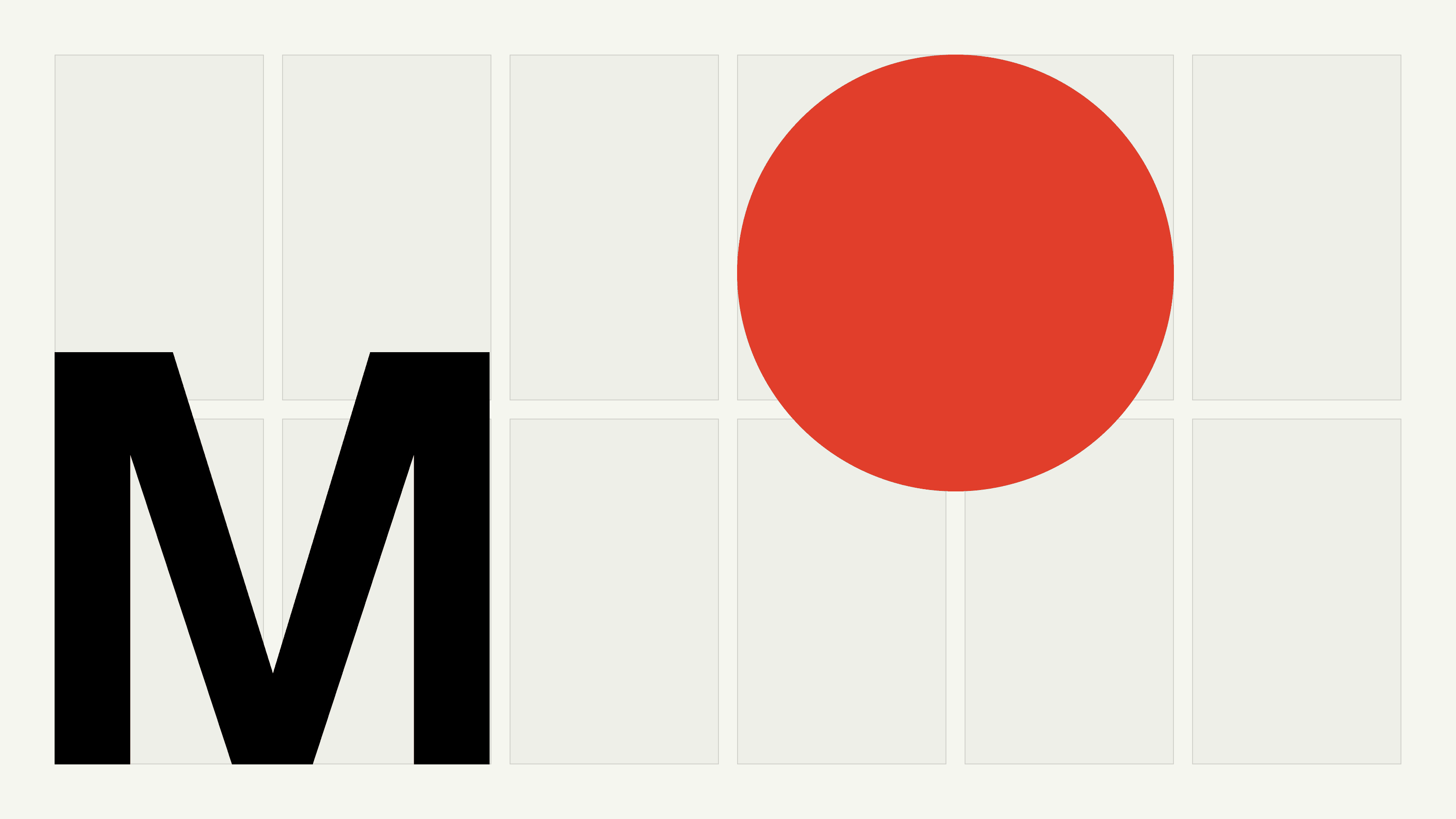 Grid with large black letter M and red circle.