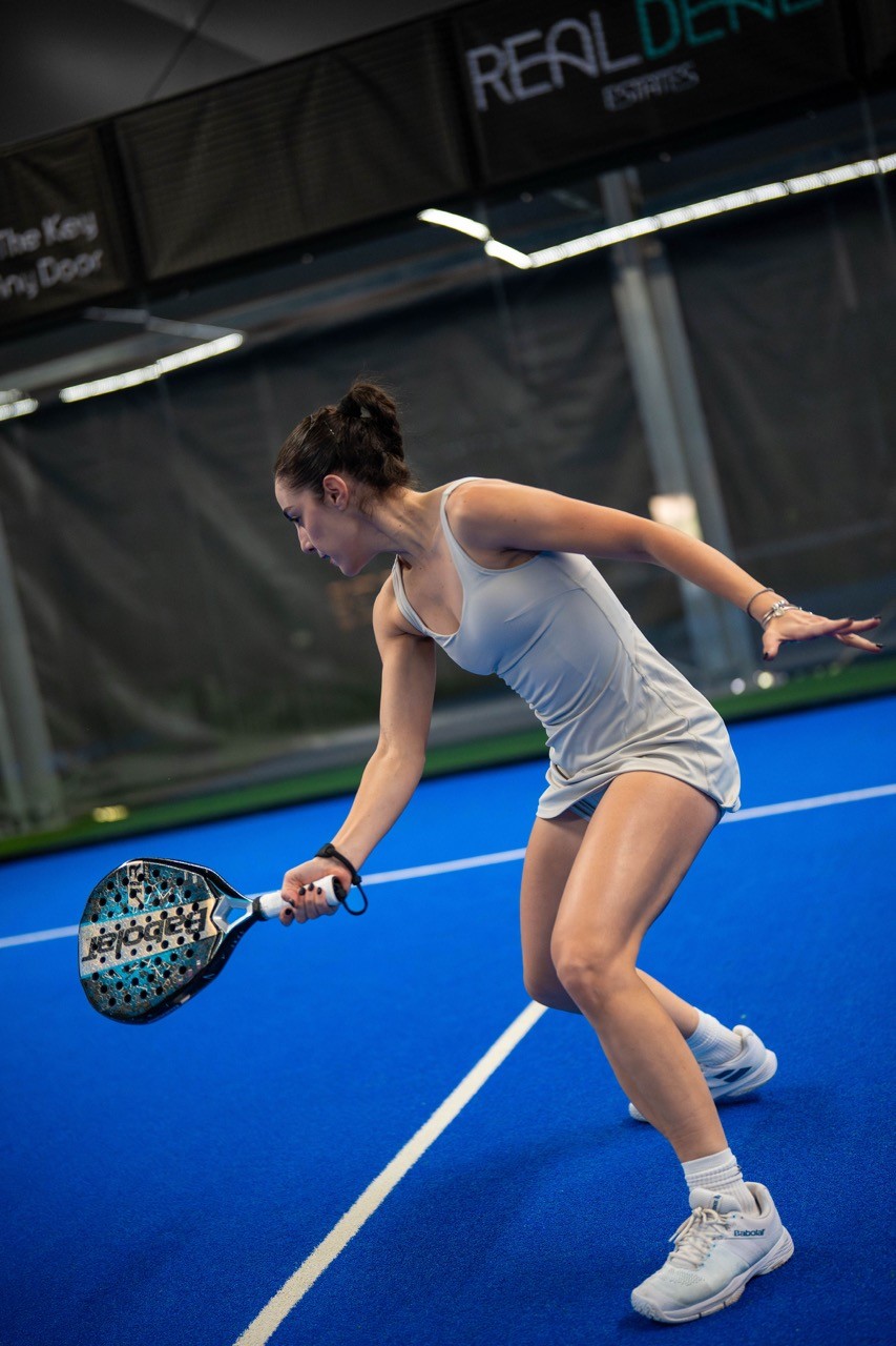 Person playing padel at Green Padel Club
