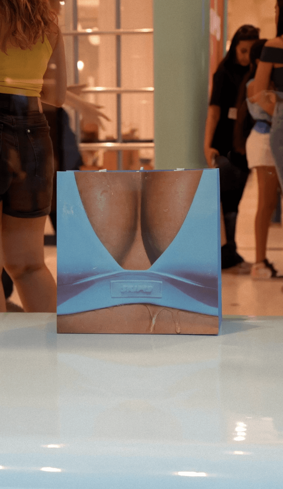 Bride and groom walking on street at night