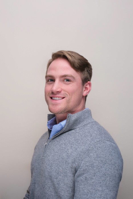 african american woman corporate headshot in photography studio