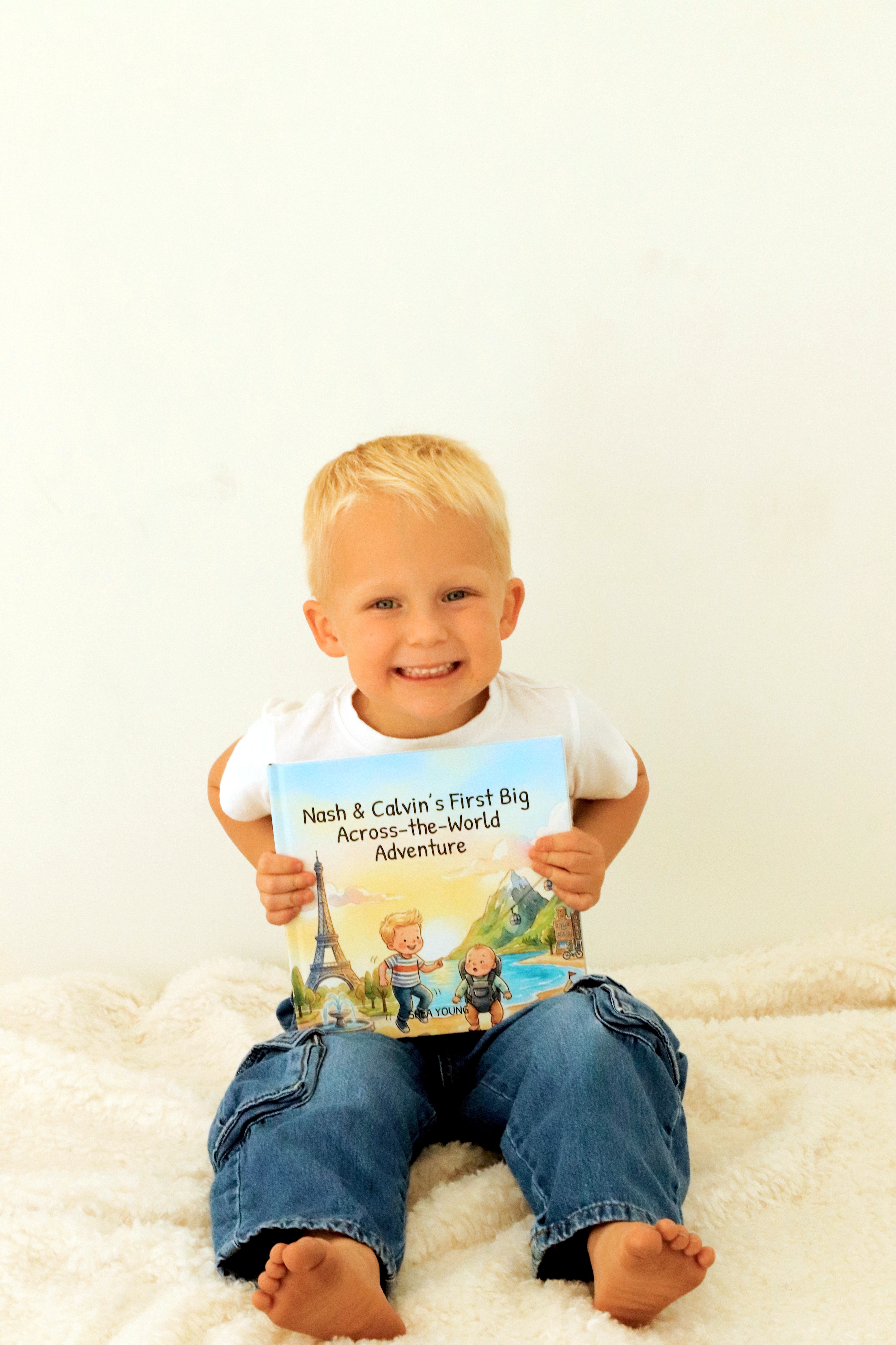 Close-up of a dark green leaf showing its textured surface and central vein against a muted background.