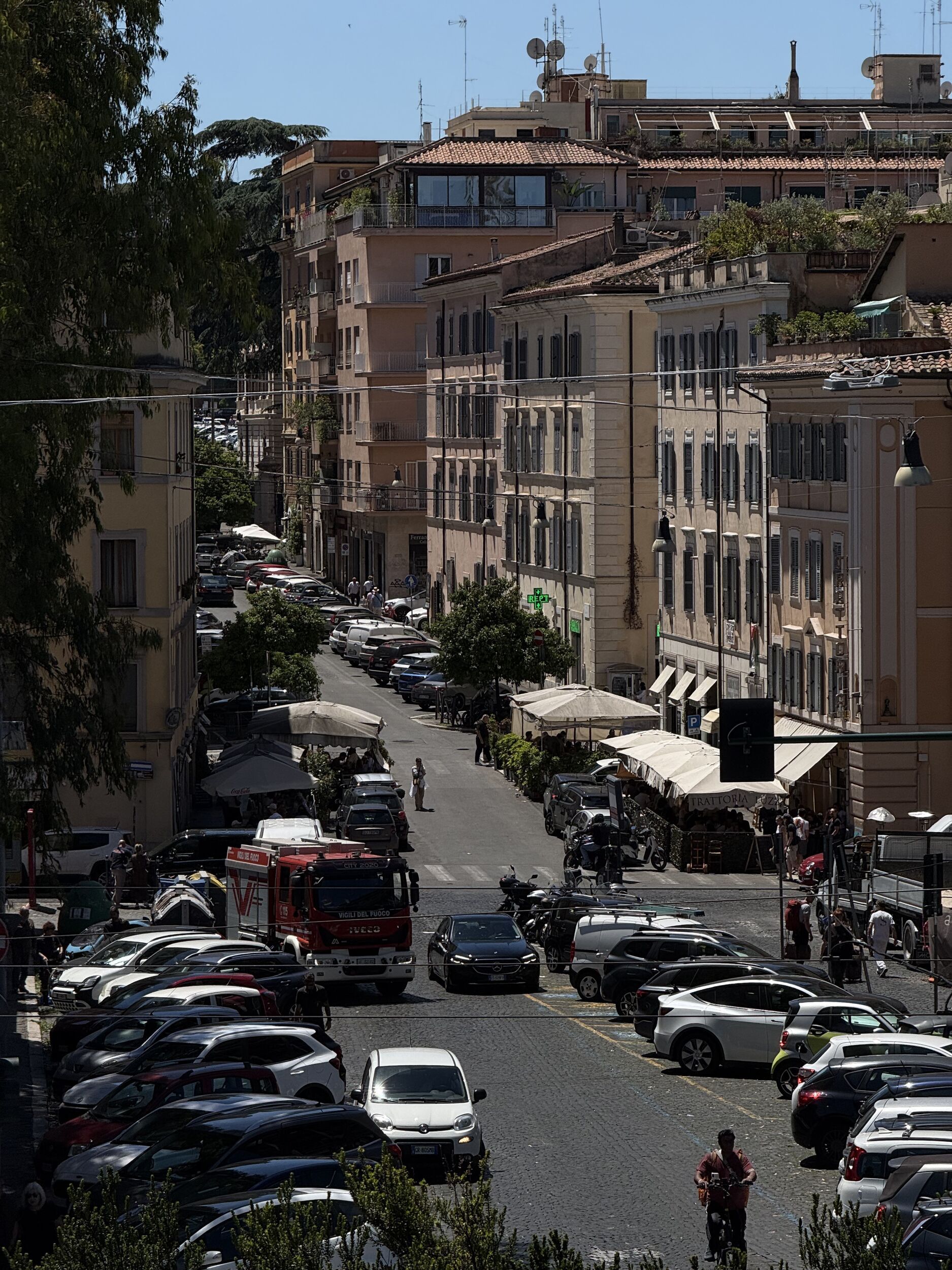 Dusk walk through the Celian Hill, showing a calm historic street between Villa Celimontana and central Rome