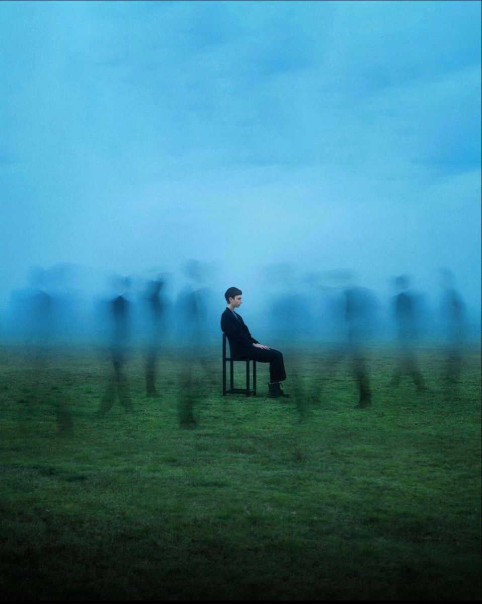 Man sitting on chair outside