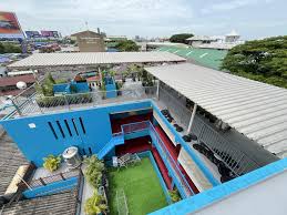 man in black crew neck t-shirt wearing black framed sunglasses
