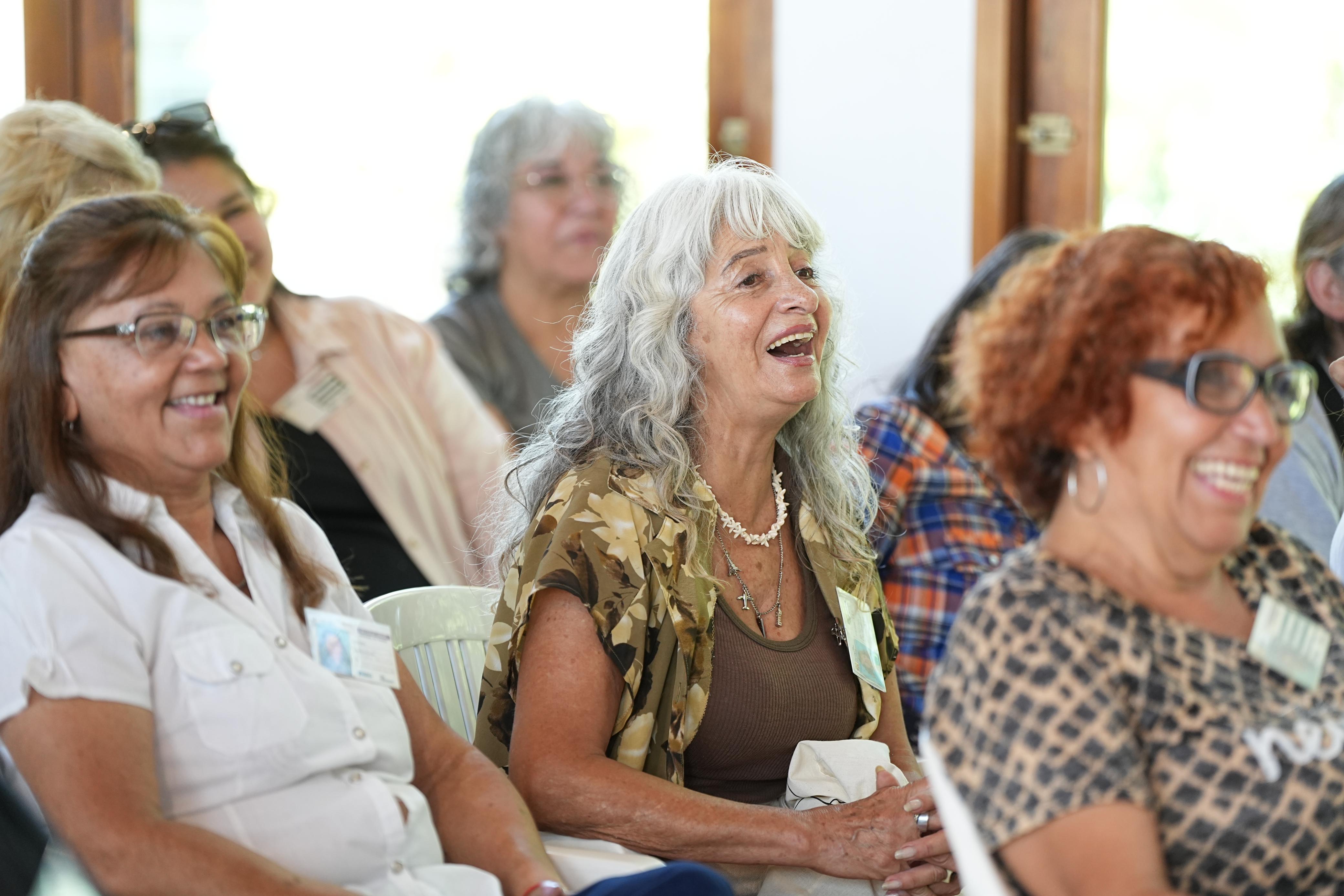 Speaker Presenting at Conference with Audience