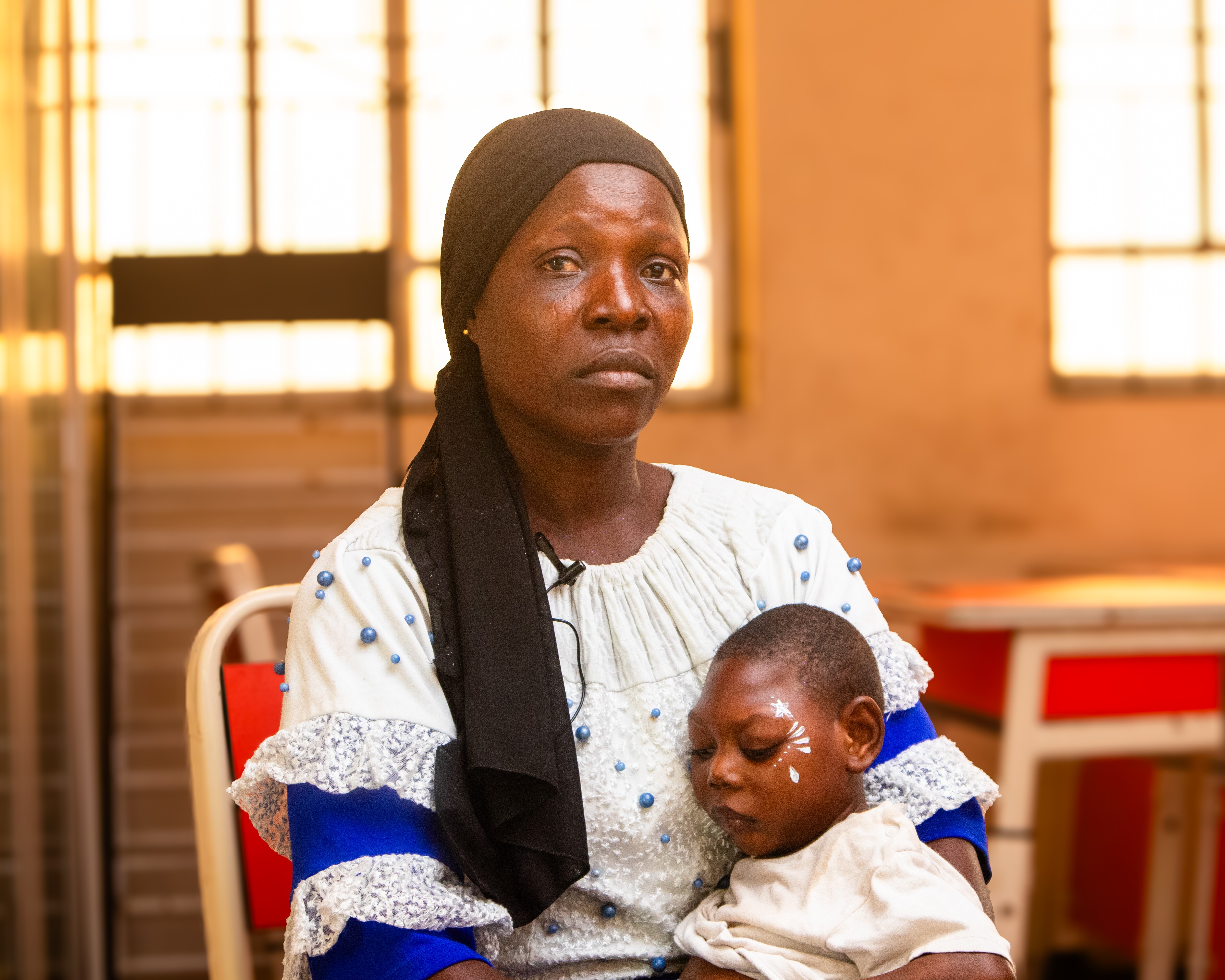 Mrs. Tunrayo Oba with her child