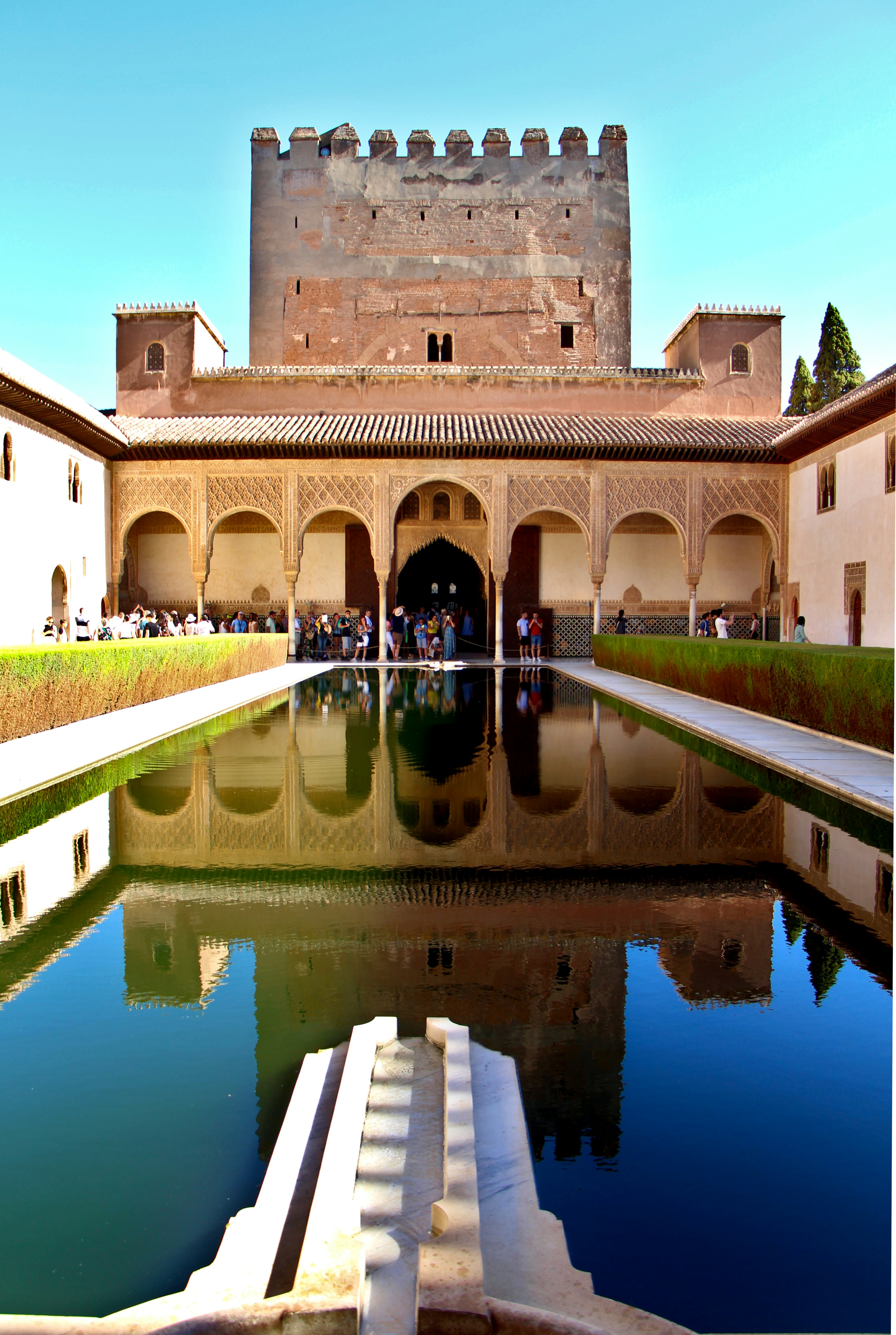 Alhambra with a pond in front of it