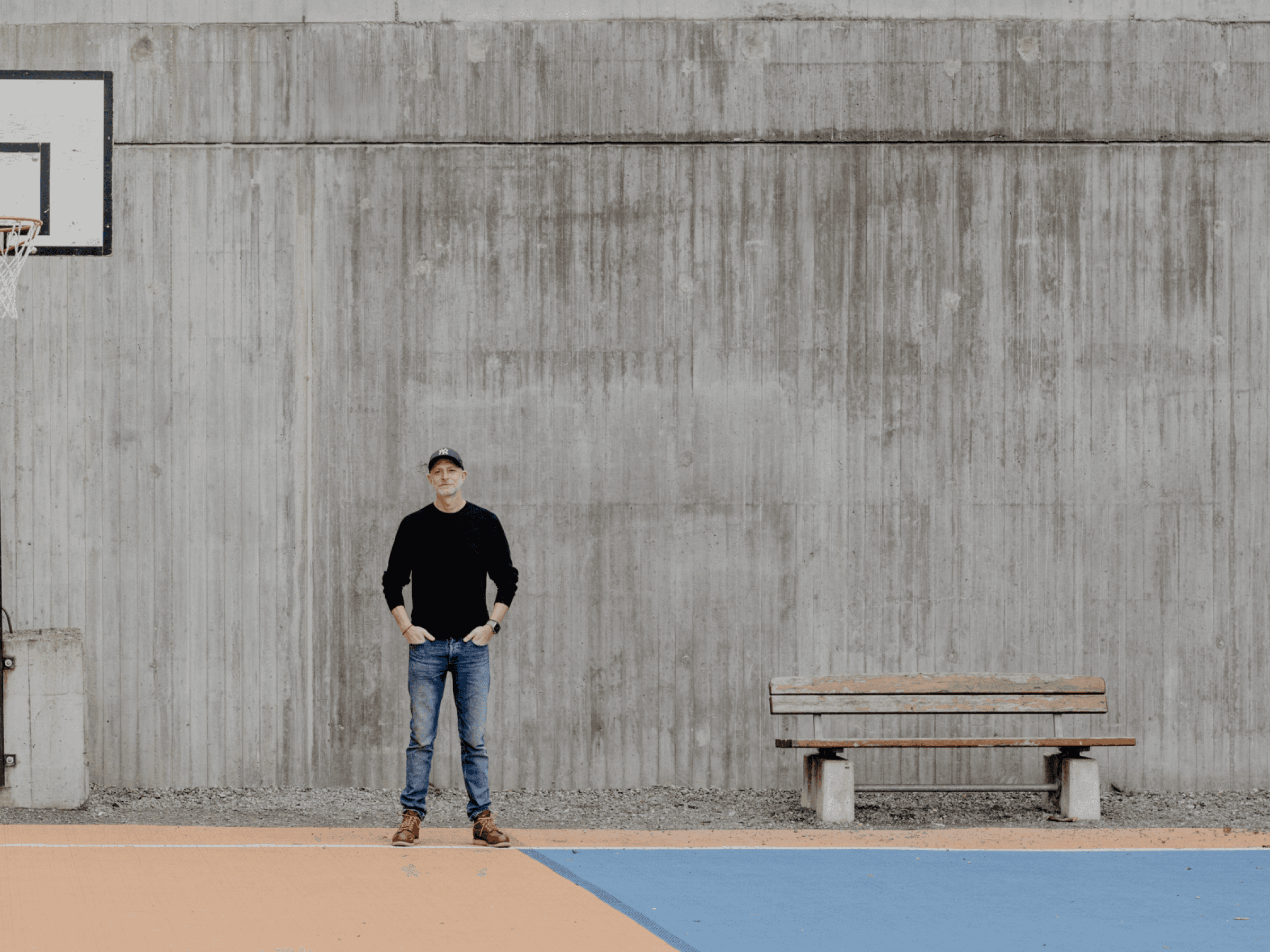 Image of Linus standing on a basket court