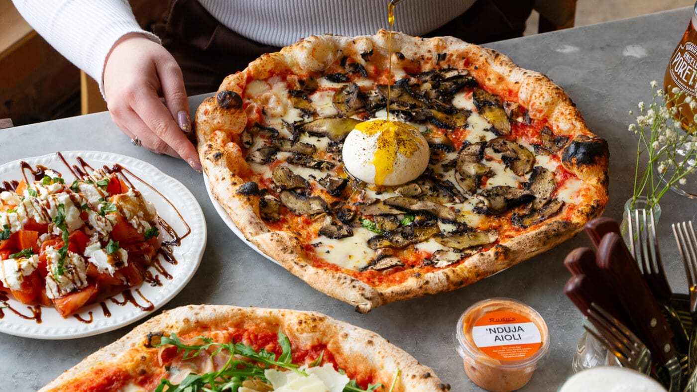 Neapolitan pizzas being served at Rudy's