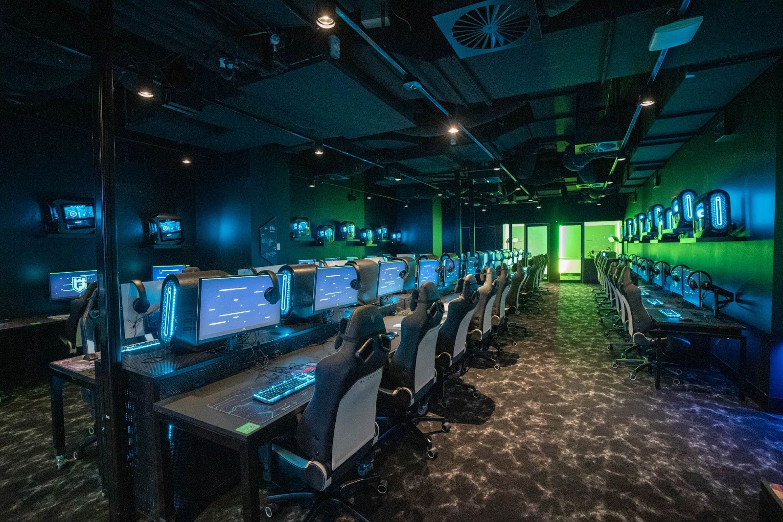 Two guys playing on computers in the Fortress Gaming Cafe in Melbourne or Sydney