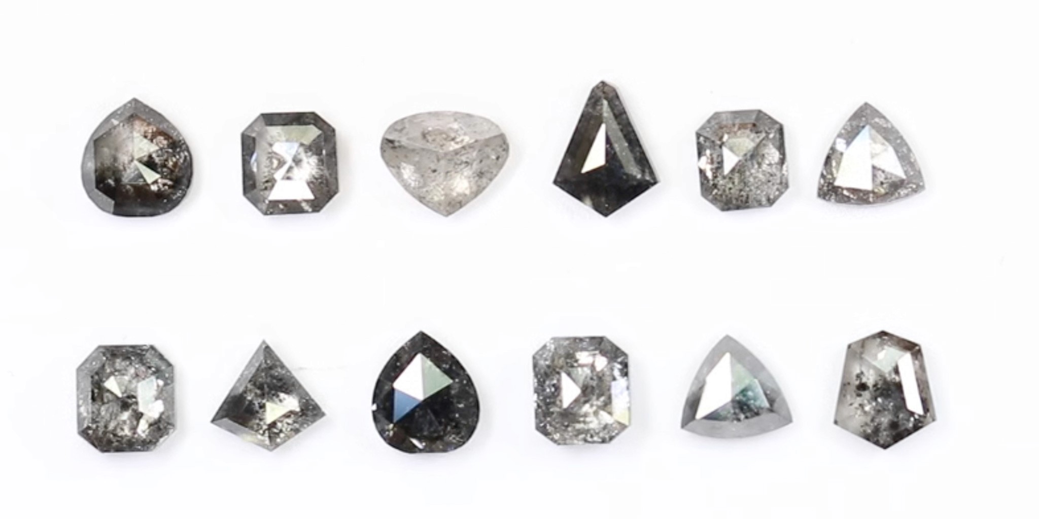 A variety of Black and Salt Pepper Diamonds in all different cuts and varieties.