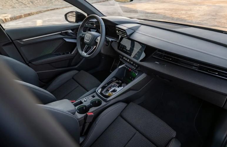 a close up of a steering wheel and dashboard of a car