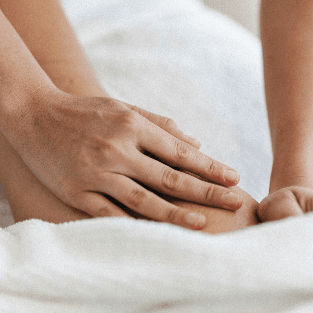 Gentle hand massage focusing on pressure points and relaxation.