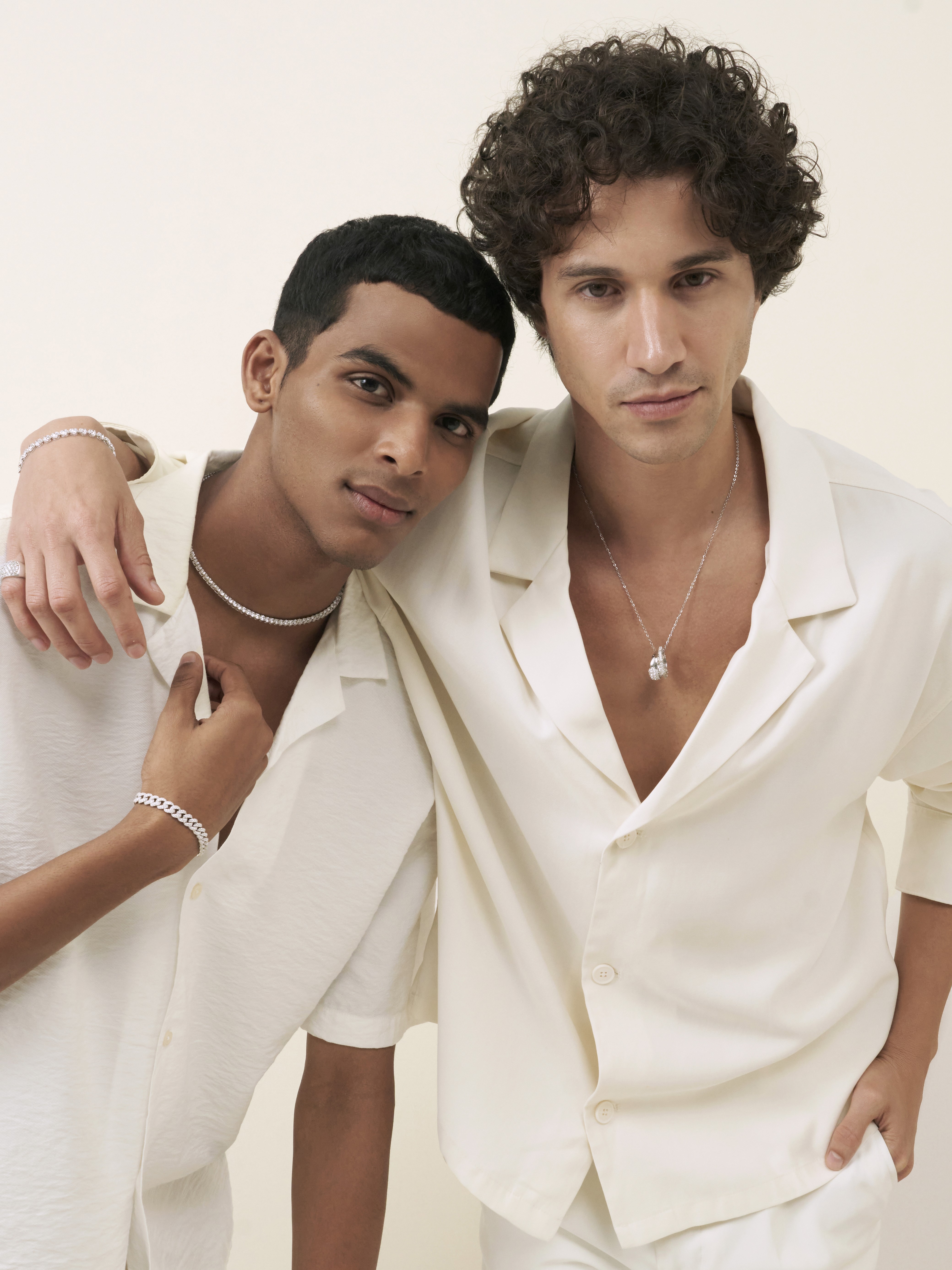 Friends laughing and posing inside a car