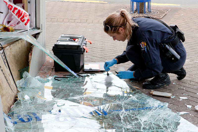 grayscale photo of person placing hand on face