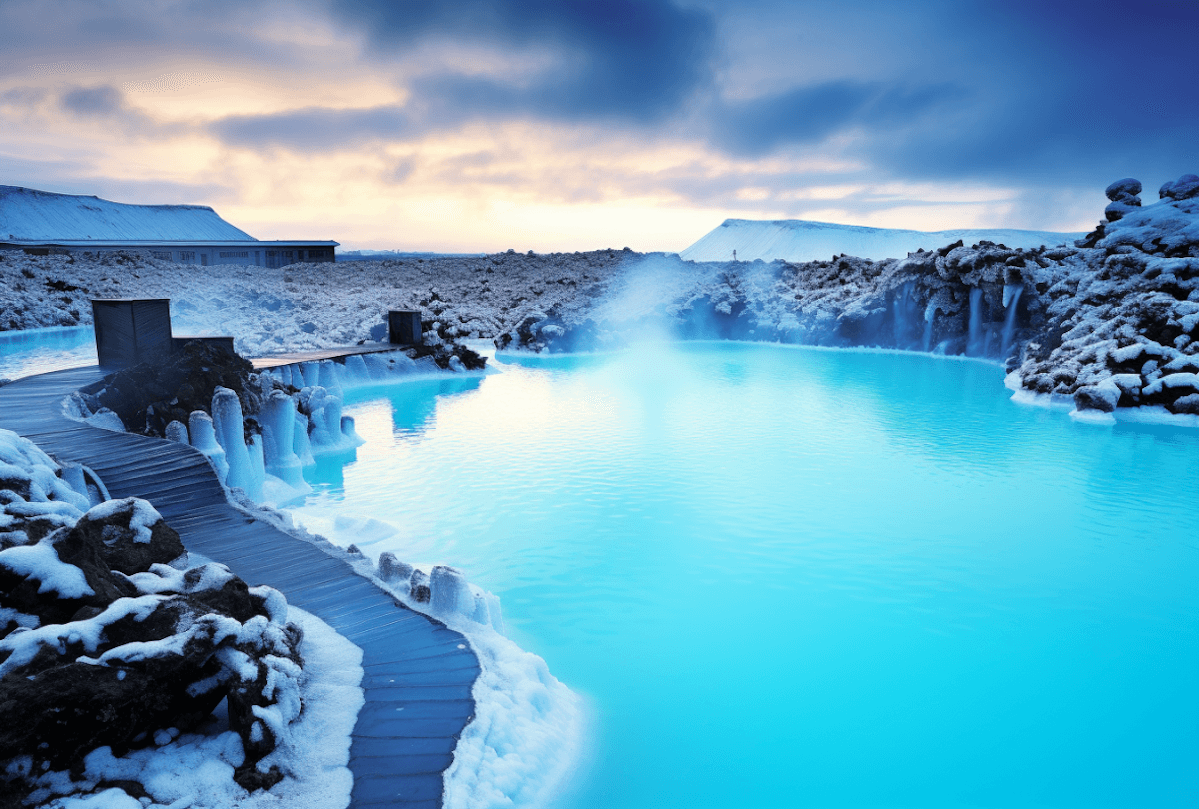 alt="Geothermal hot spring surrounded by volcanic rock and steam in Iceland."