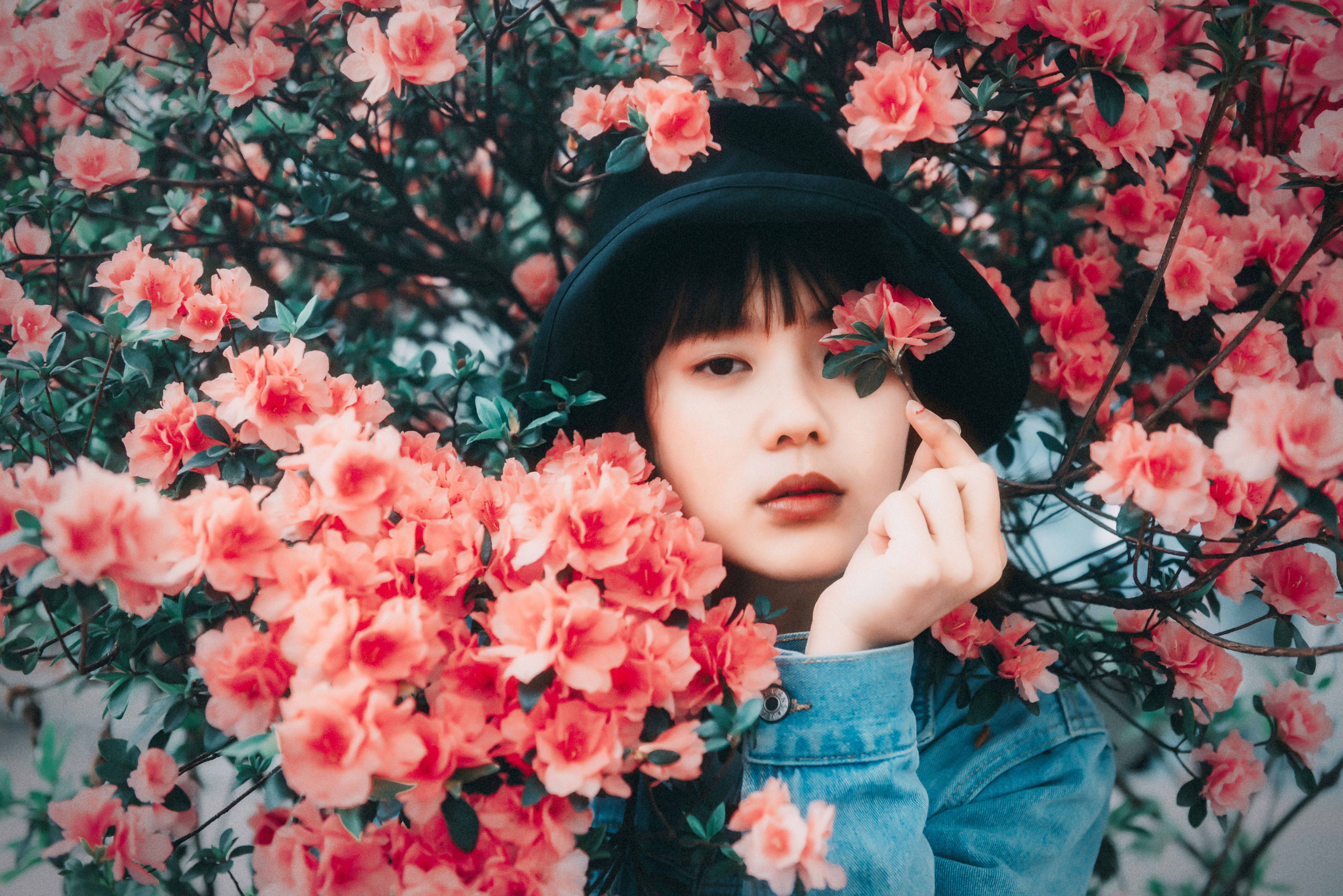 woman in a bunch of flowers - Soft Spring Color Analysis