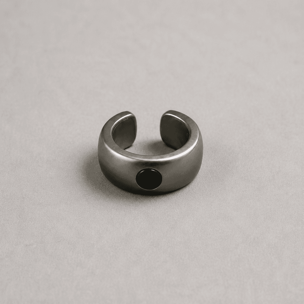 Mote Cuff-01 titanium ear cuff with sapphire detail