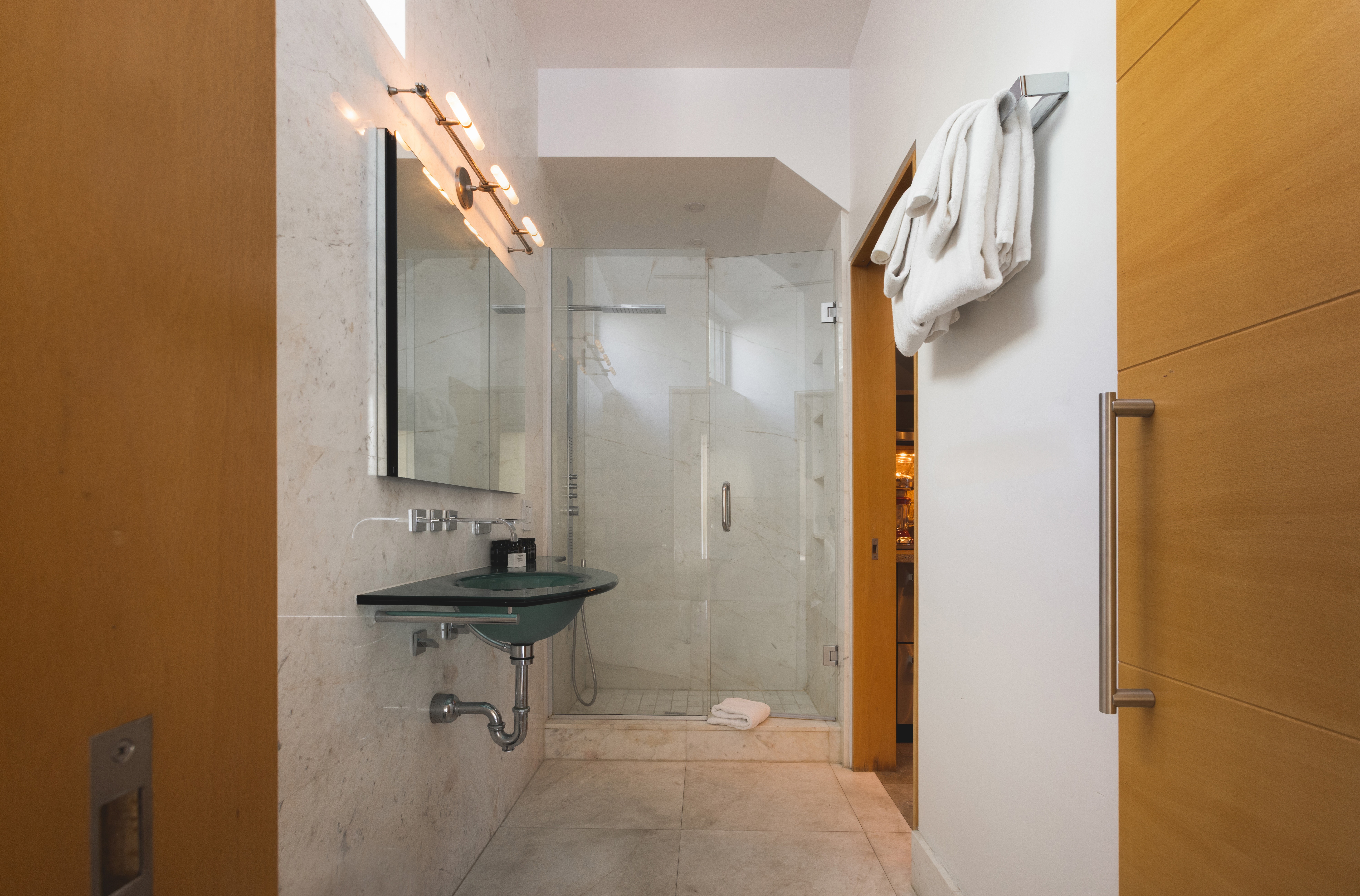 bright and spacious bathroom at Contra House, perfect for group stays in a private Key West retreat