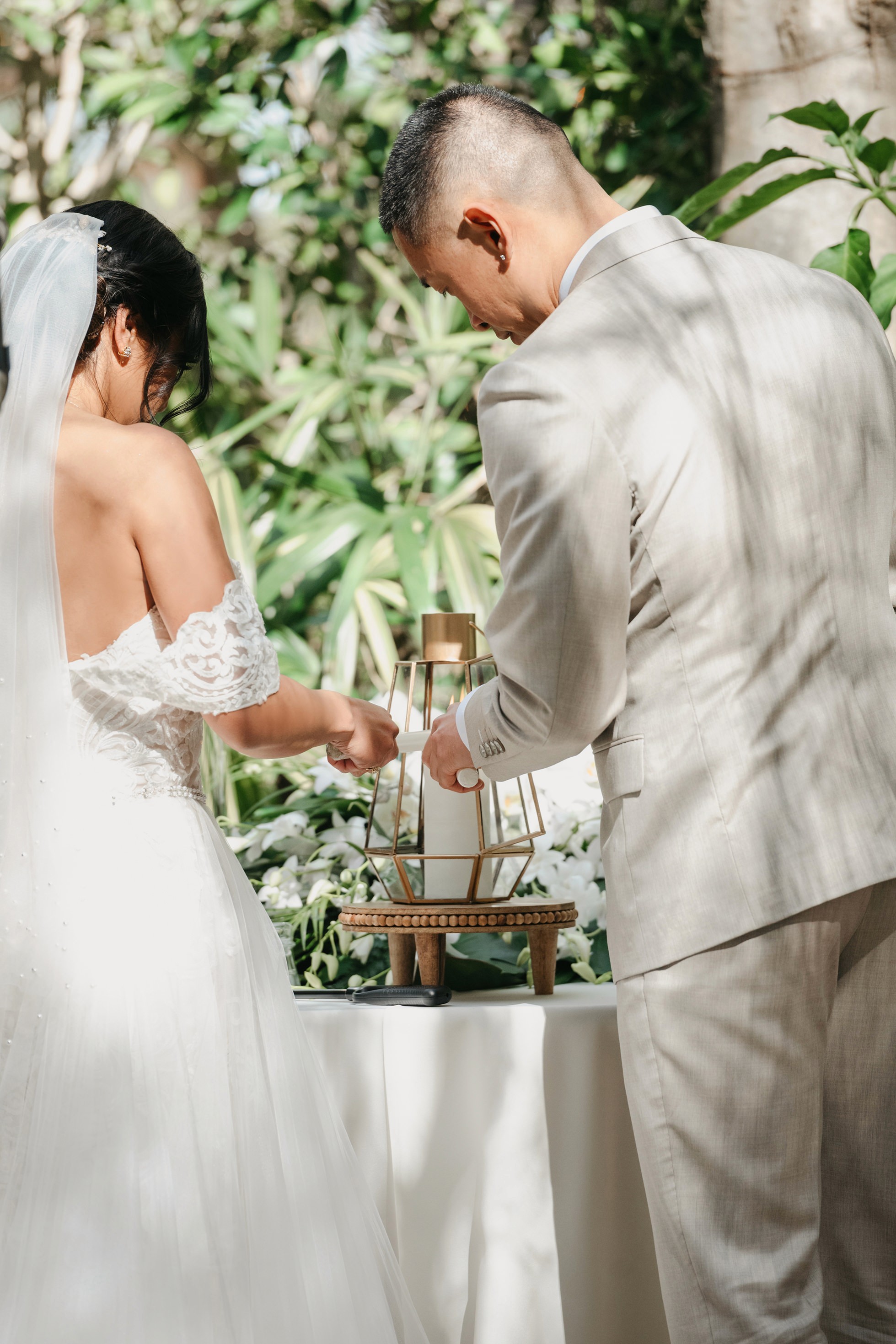 Flat lay wedding details with bouquet, rings, and sparkling bridal heels