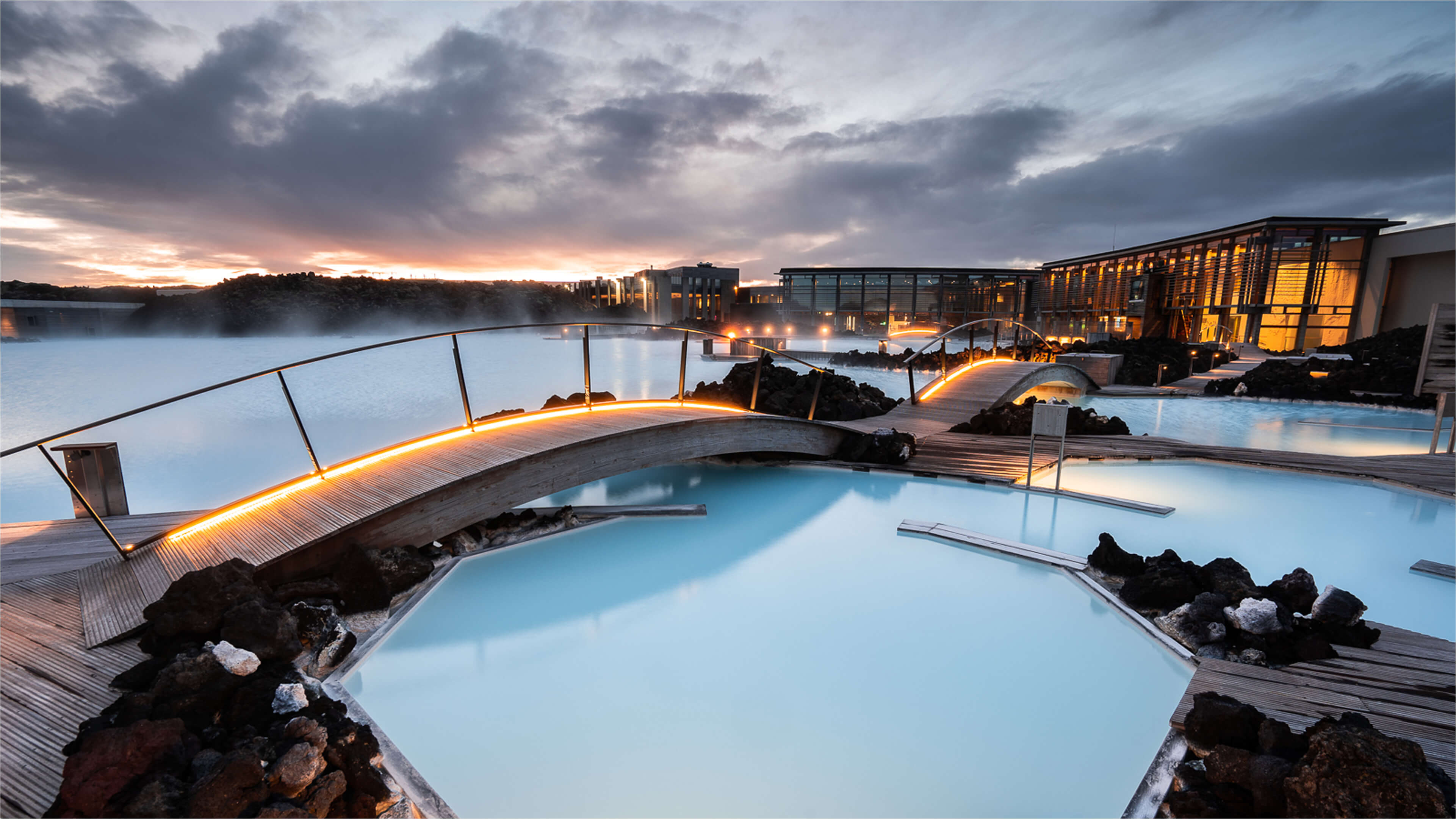 Blue Lagoon with bridge crossing the milky blue waters.