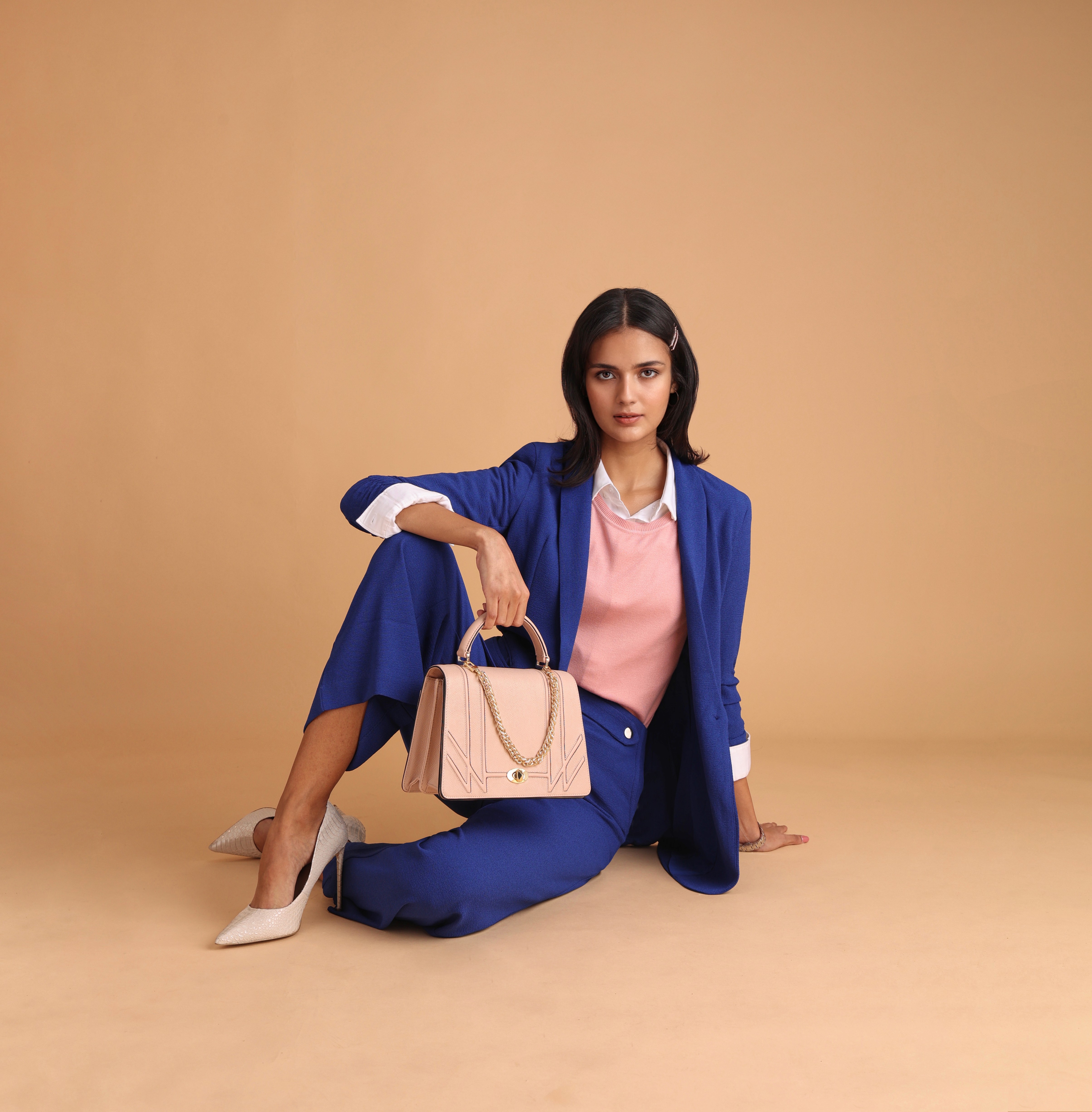 Friends laughing and posing inside a car