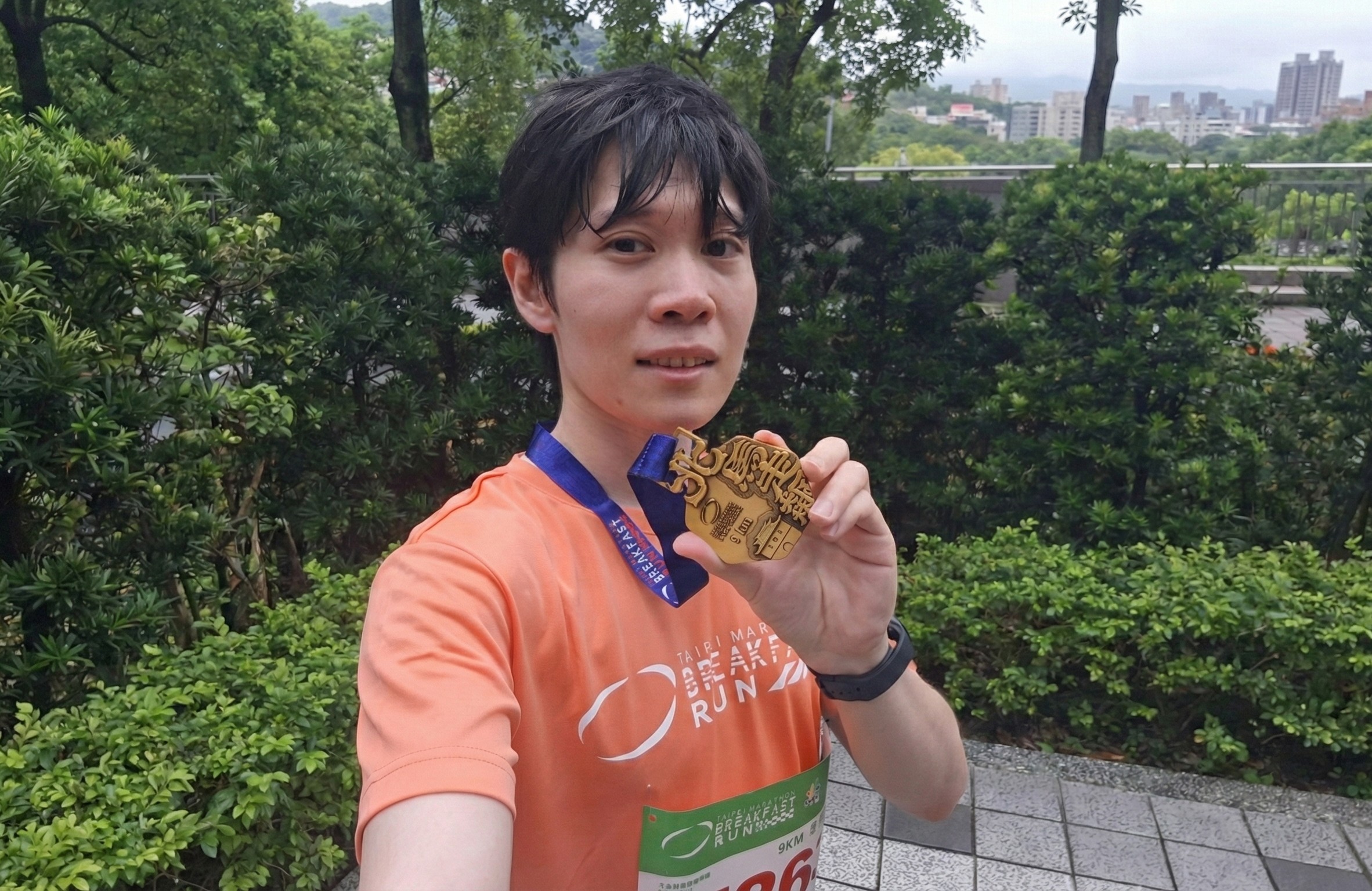 Riding a bicycle with V sign