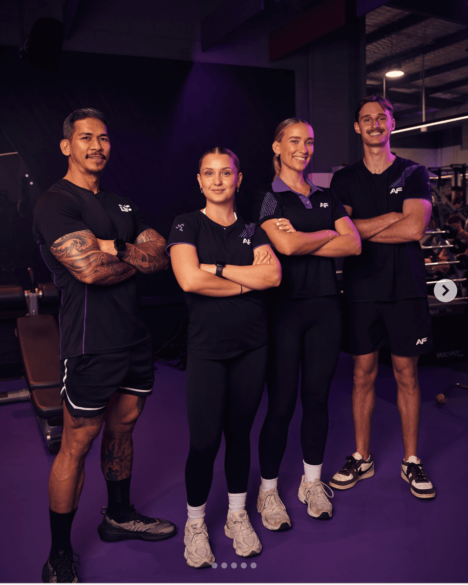 person holding Visa card and white device