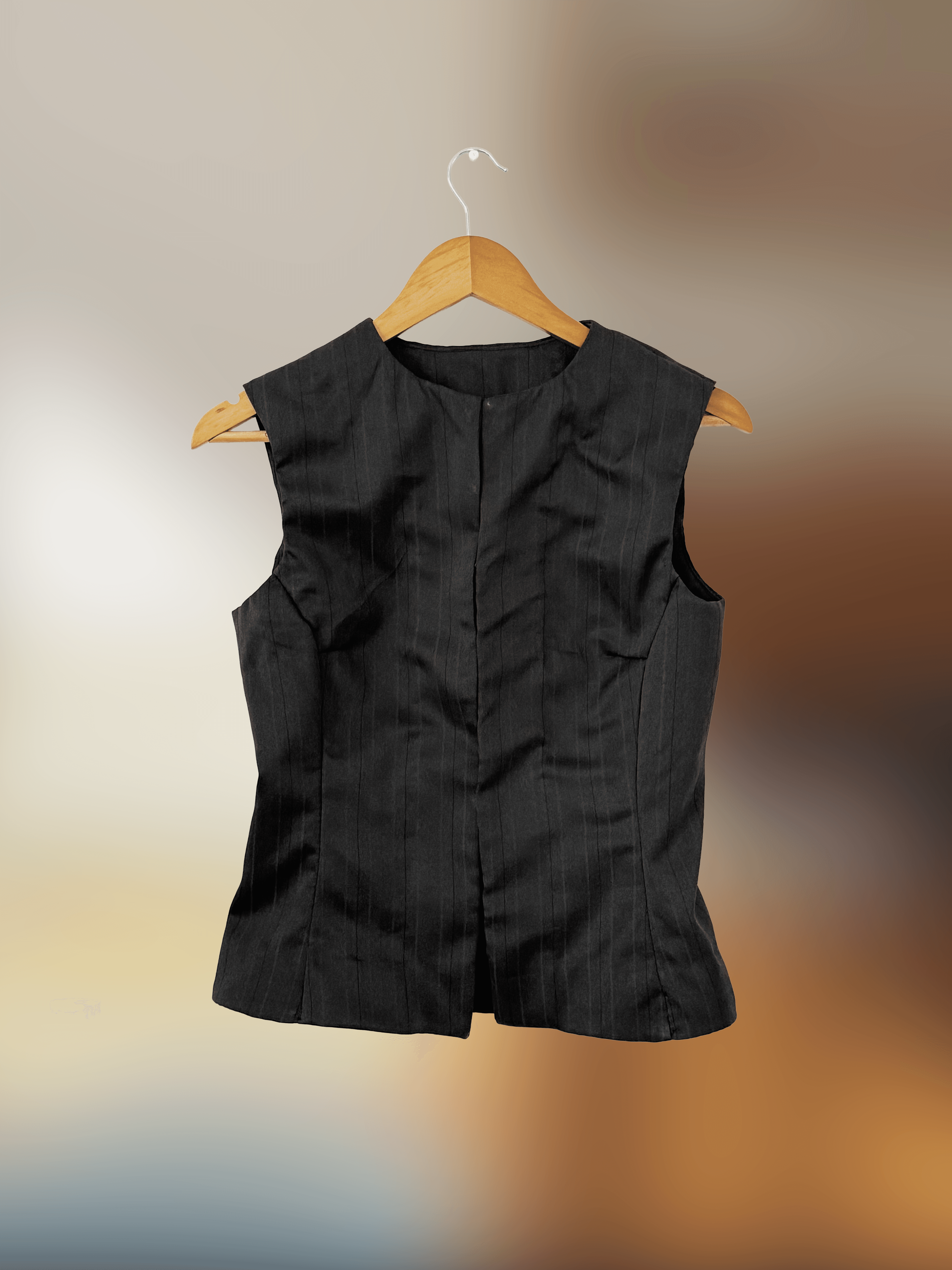 Front of black pin-stripe sleevless vest 
