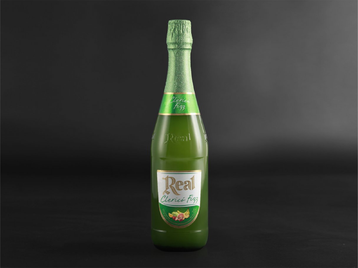 Rustic cabin in a golden field at sunset